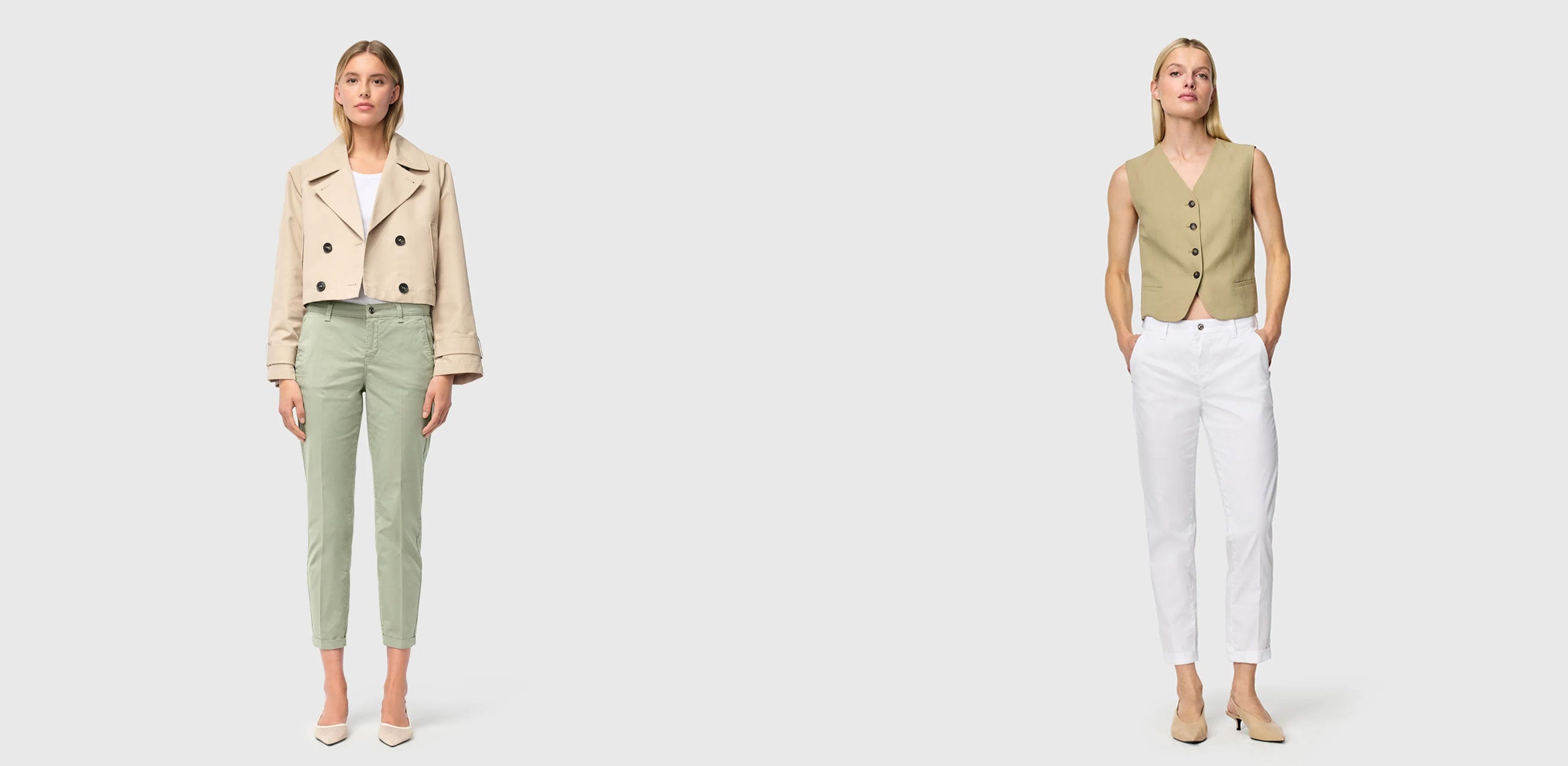 Two women wearing cropped chinos: one styled with light green chinos and a beige cropped jacket, the other with white chinos and a beige sleeveless vest.