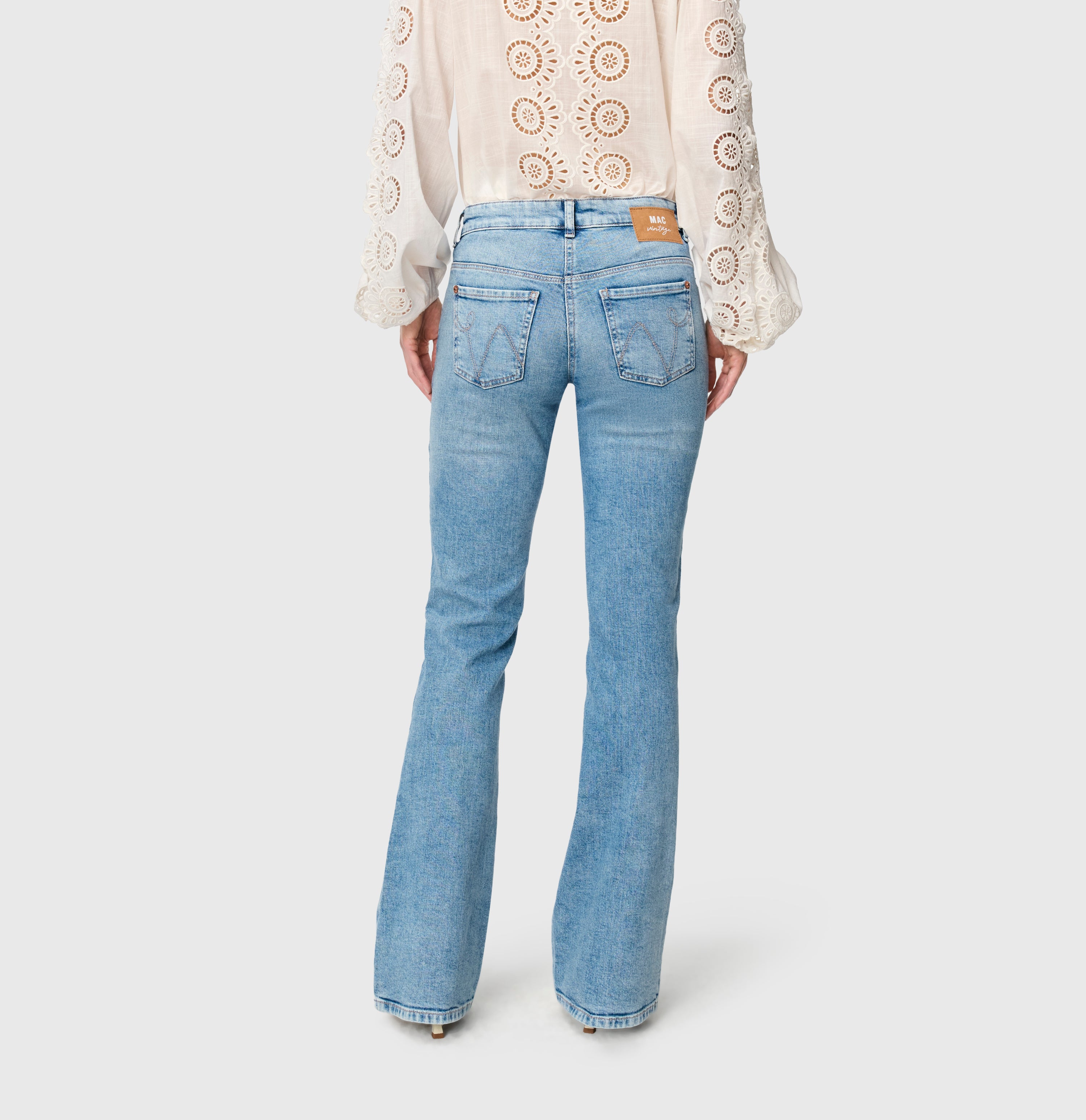 Flared jeans with modern details. | DETROIT flared | 90`s cool wash | Back view of model