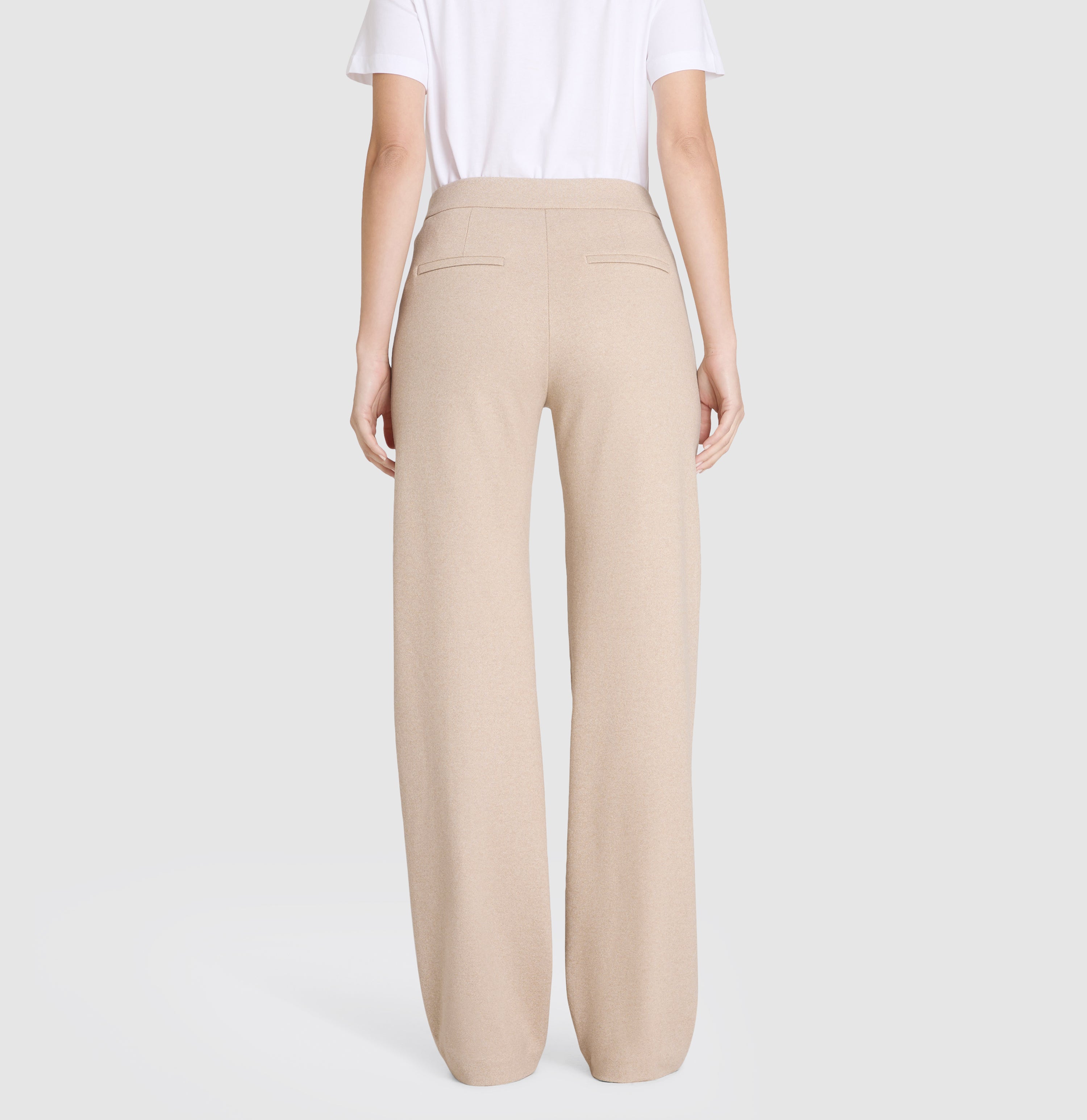 Wide jump-in trousers made of premium jersey. | CHIARA SMART | light shadow melange | Back view of model