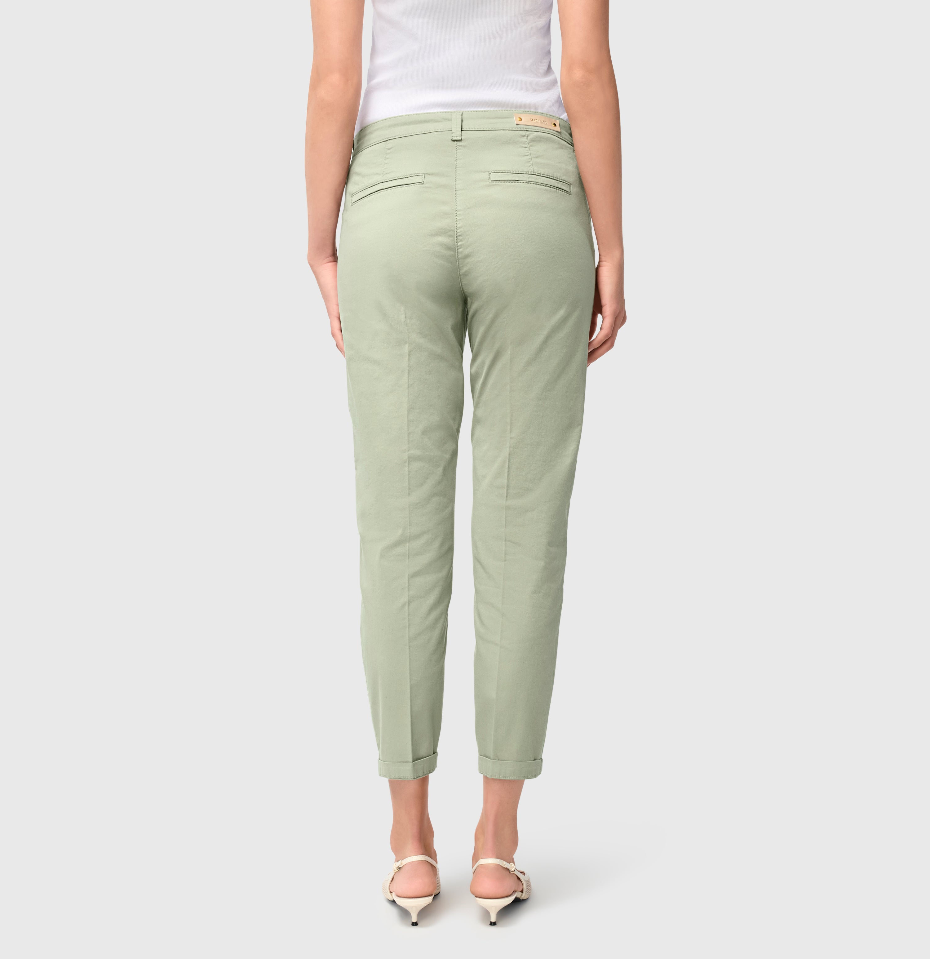Turned-up chino with creases. | S-NAME | S-FBBZ | Back view of model