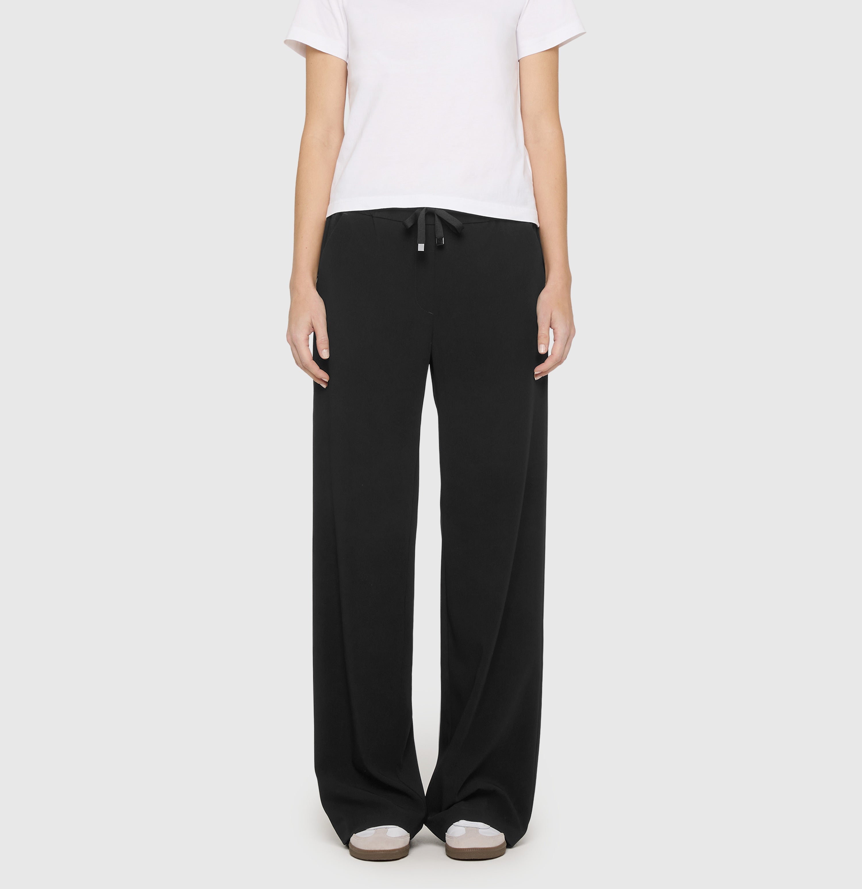 Wide jump-in trousers in a soft crepe material. | CHRISTY | black | Front view of model