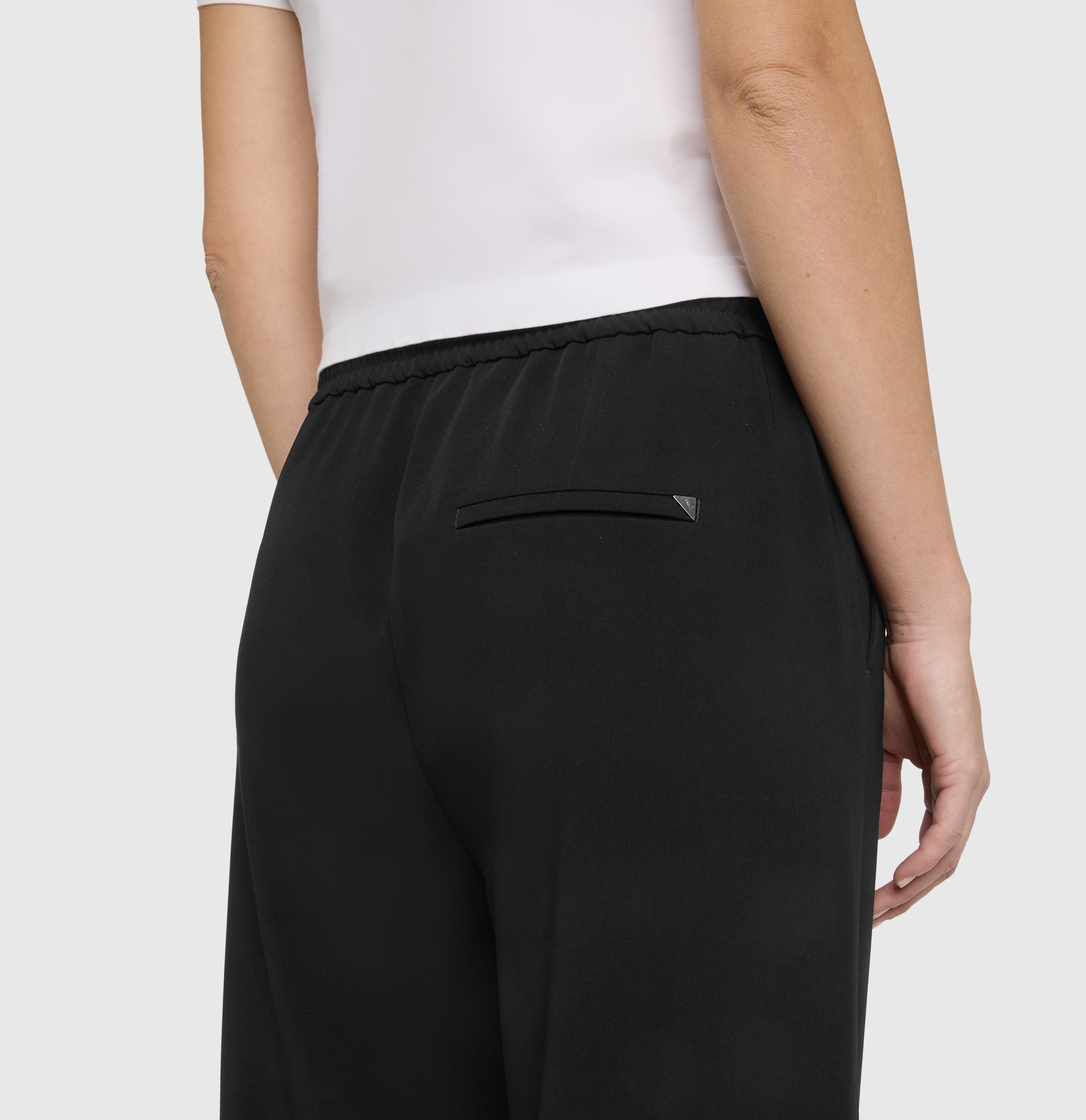 Wide jump-in trousers in a soft crepe material. | CHRISTY | black | Side view of model