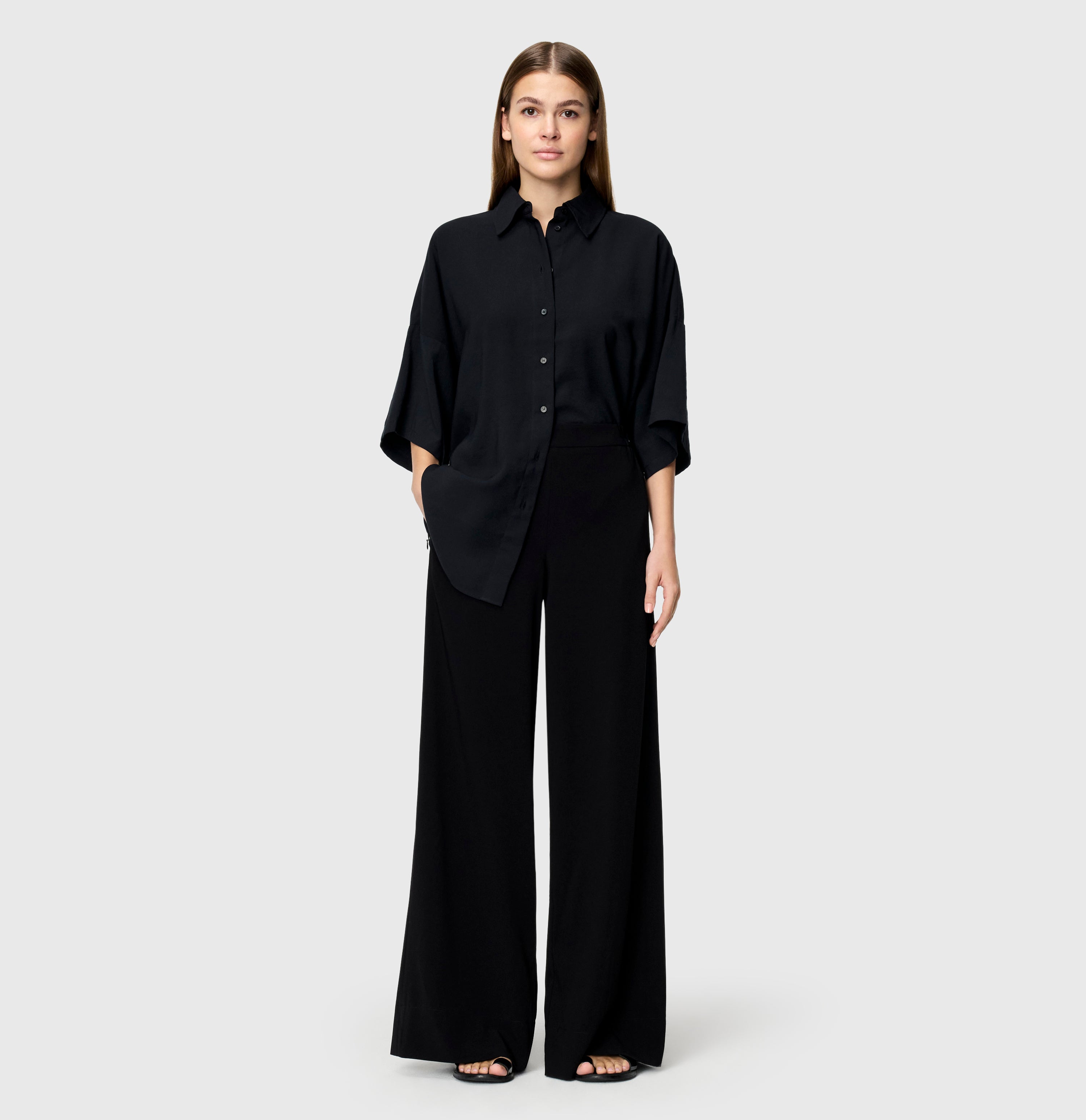 Wide, flowing trousers made of floating crepe. | CORALIE | black | Full-body of model