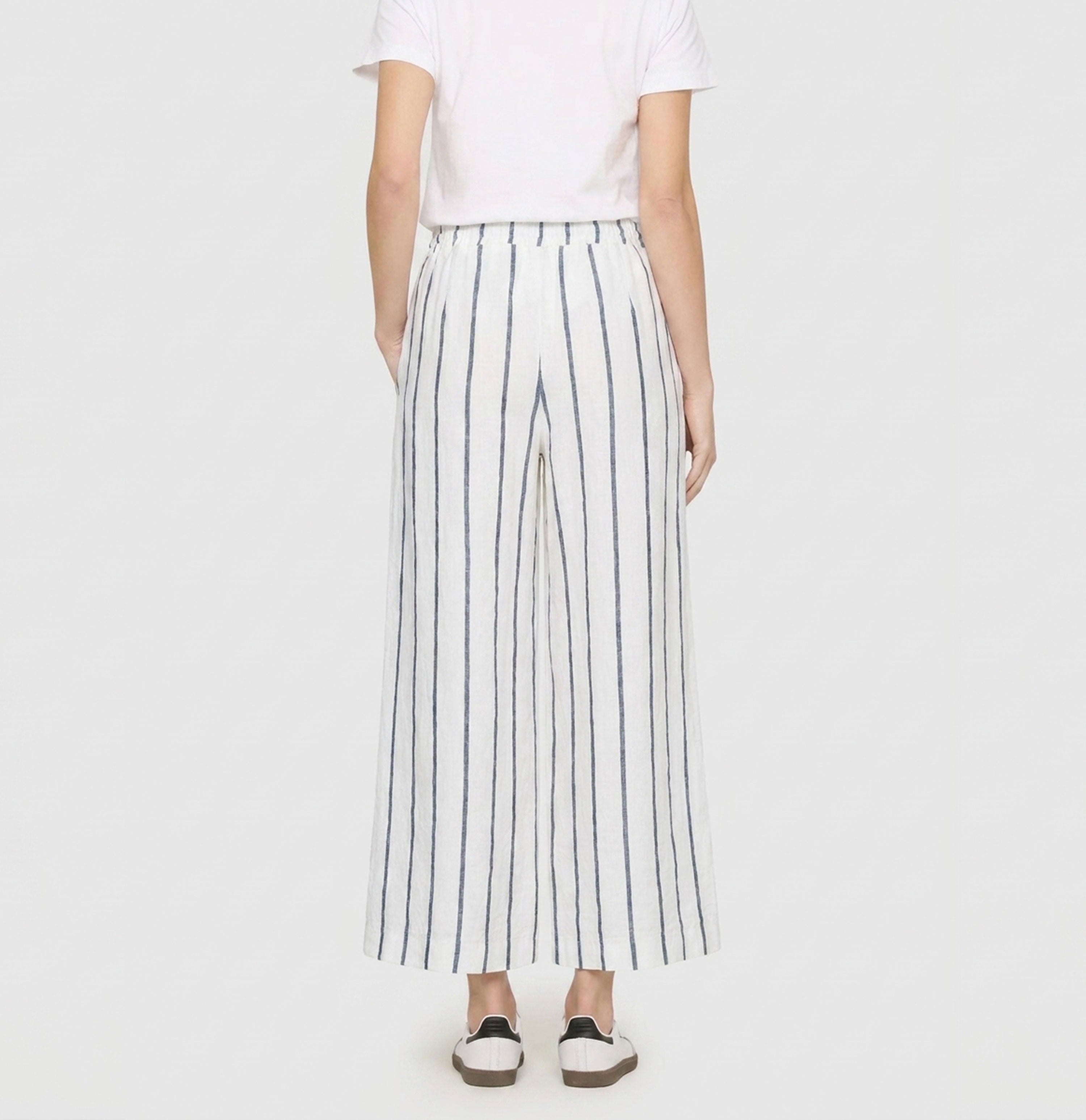 Wide culotte made of pure linen. | CALLIE cropped | marine stripes | Back view of model