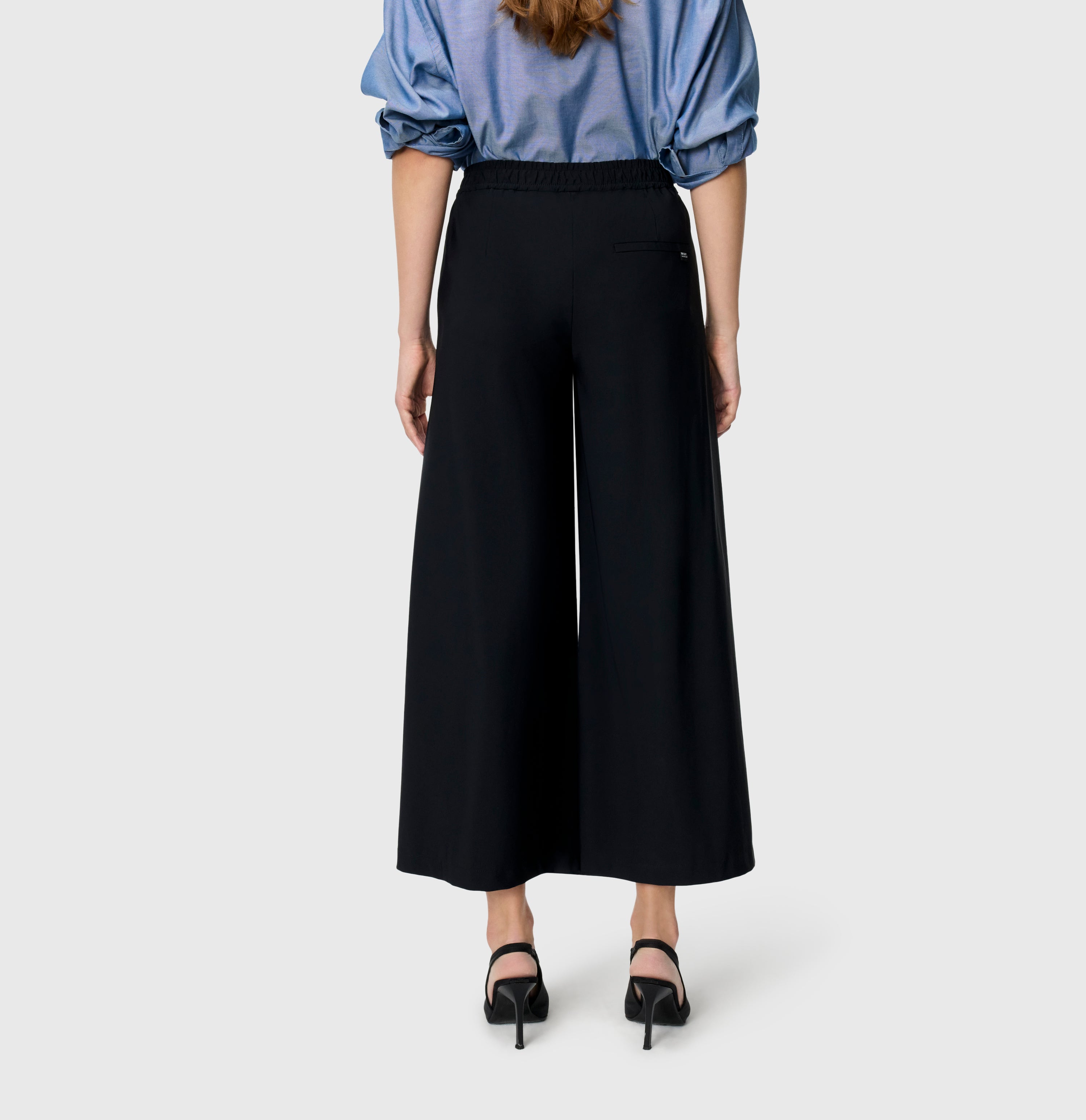 Extra wide jump-in trousers with belt detail. | PIA | black | Back view of model