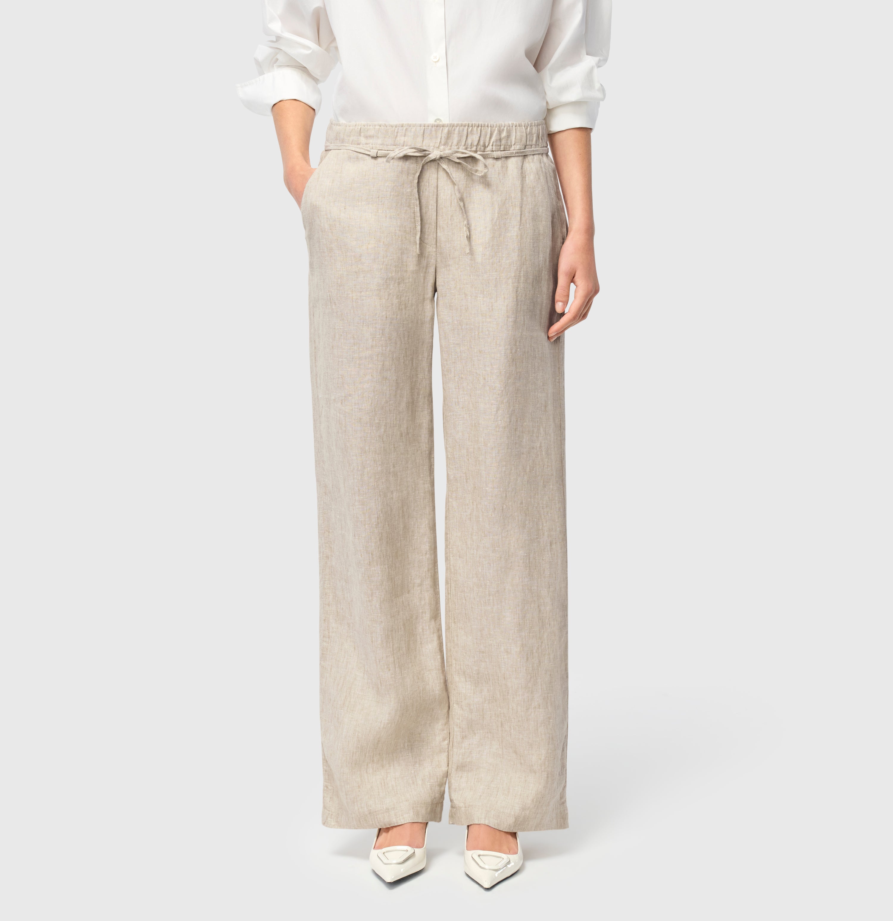 Wide trousers made of pure linen. | CHIARA BELT | almond beige melange | Front view of model