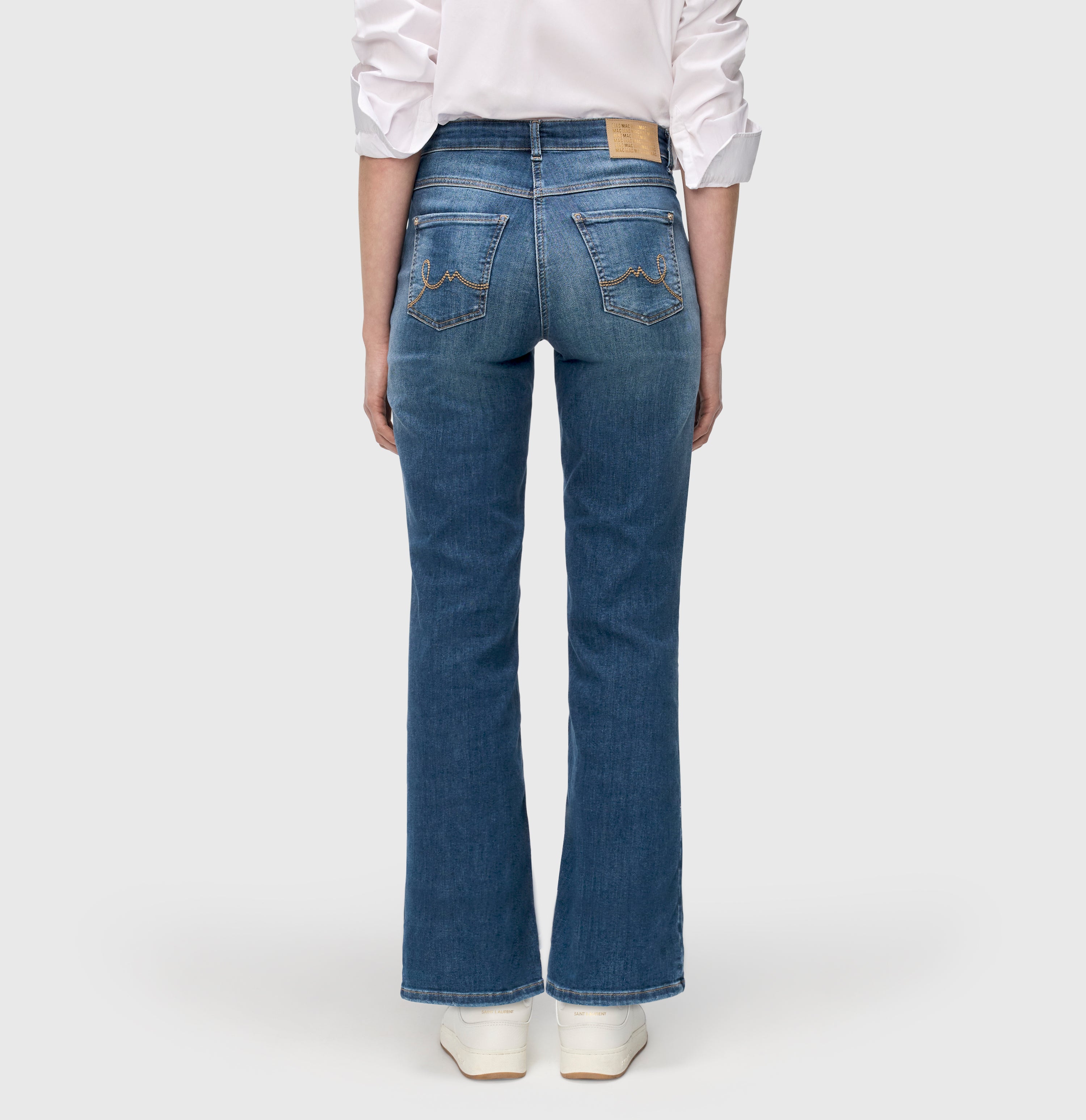 Flared fit with destroyed details and studs. | LAURA glam | indigo destroyed | Back view of model