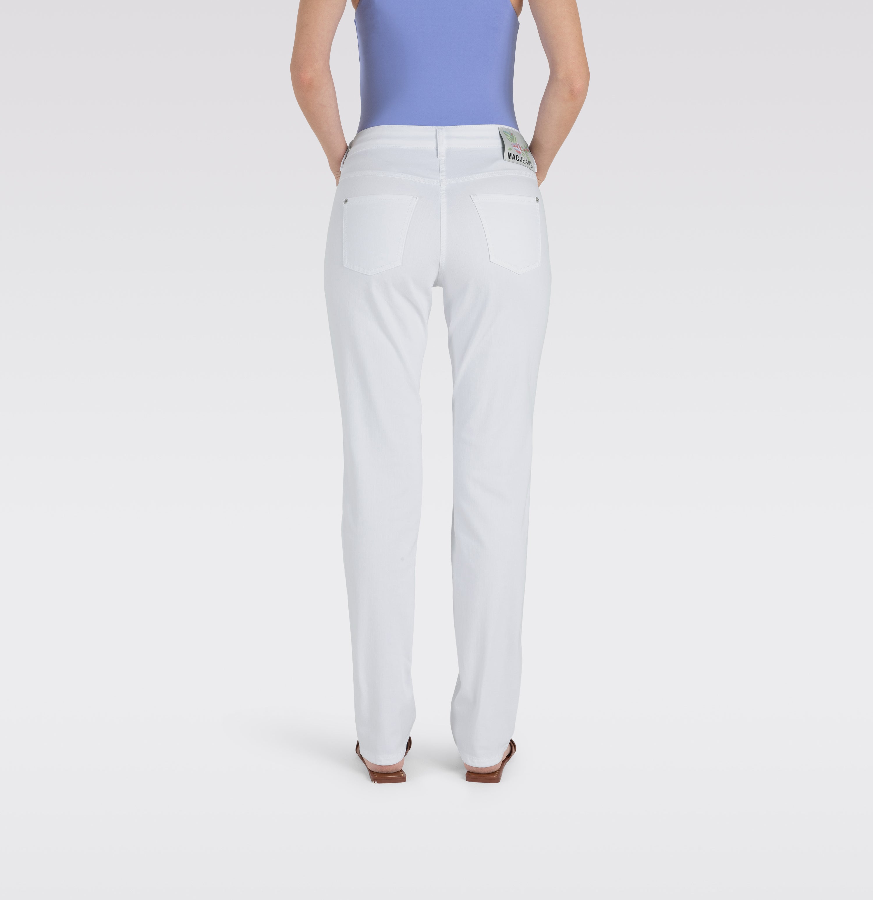Straight, figure-shaping jeans with modal. | DREAM | white denim | Back view of model
