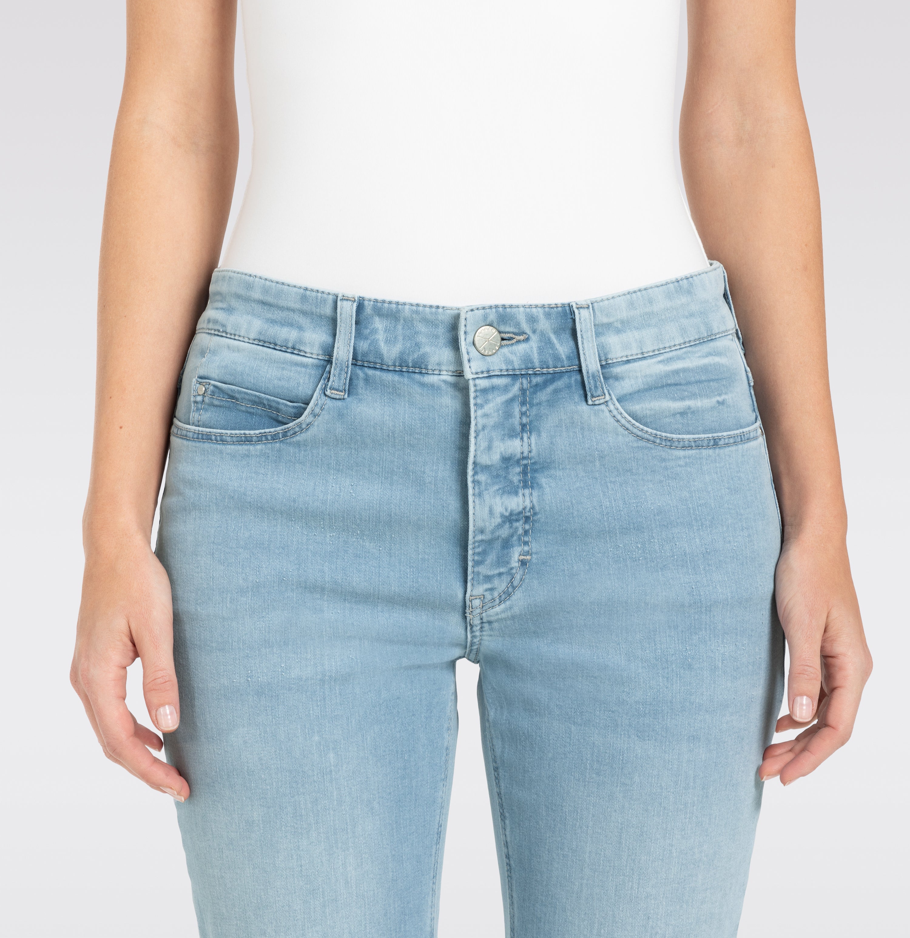 Straight jeans with shaping effect. | DREAM | aqua blue random wash | Side view of model