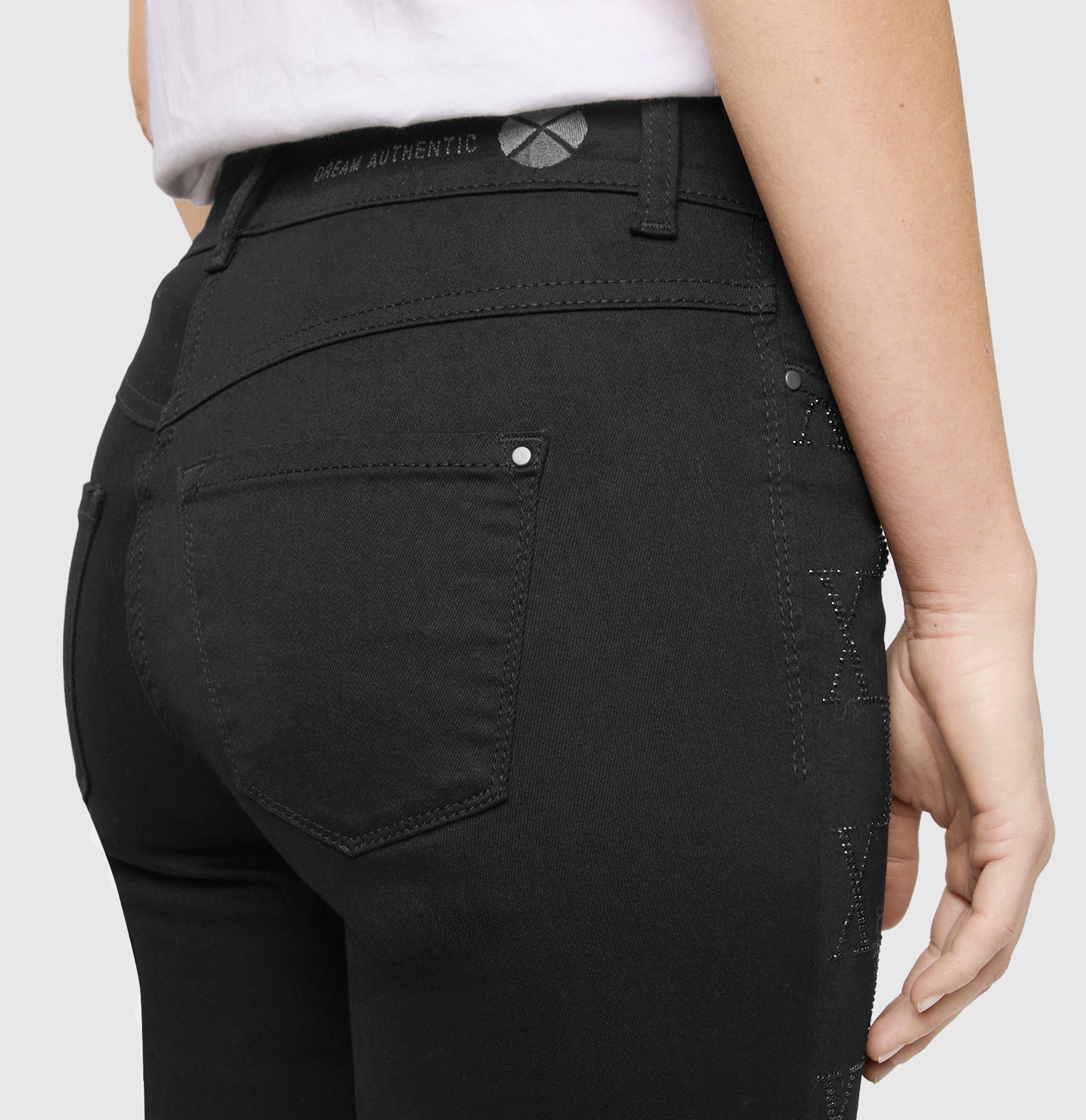 Slim hyper stretch jeans with an all-over rhinestone look. | DREAM SKINNY chain glitter | black-black | Detailed view 3 of model