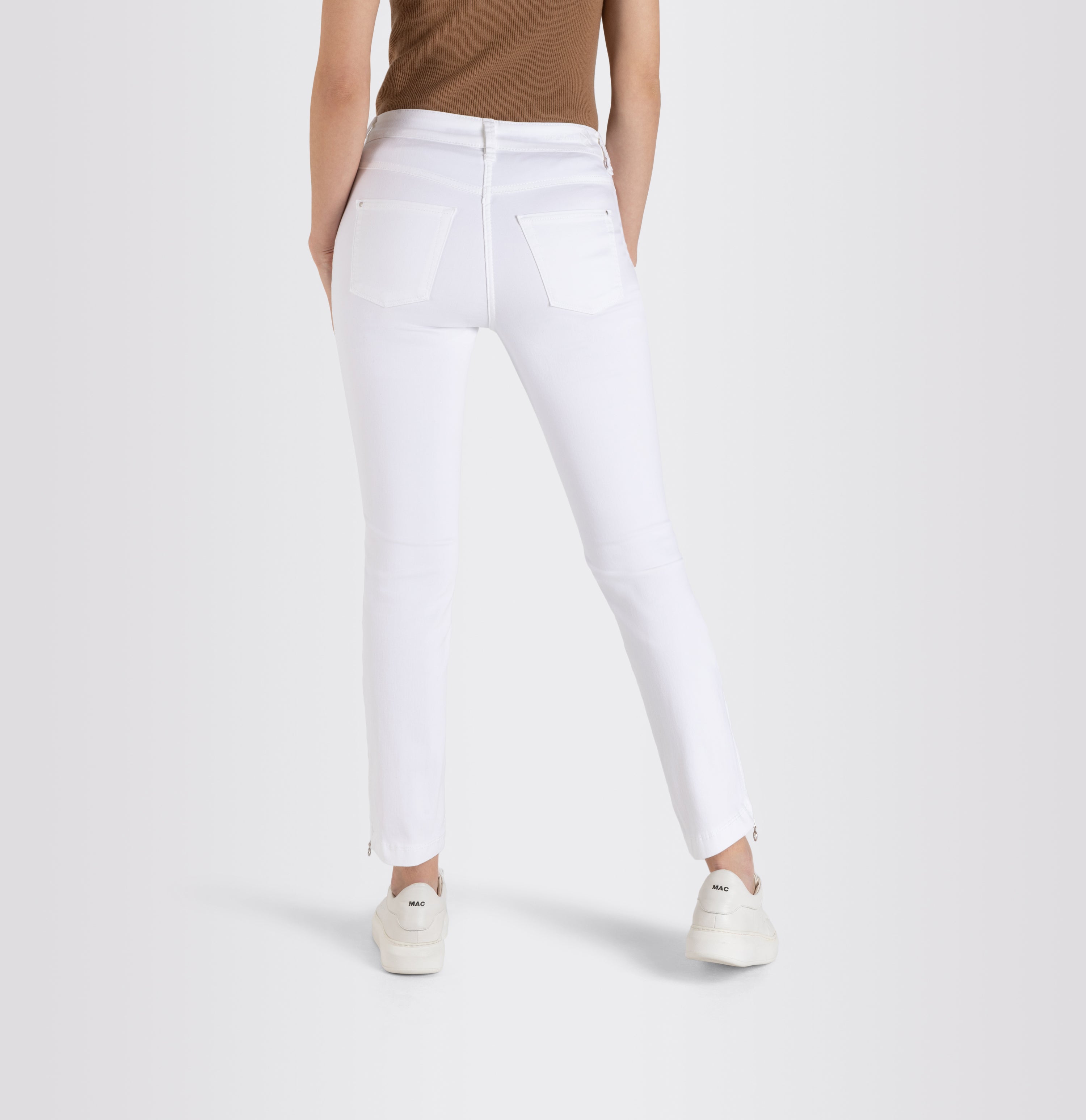 Cropped hyper stretch jeans with zip detail. | DREAM CHIC | white denim | Back view of model
