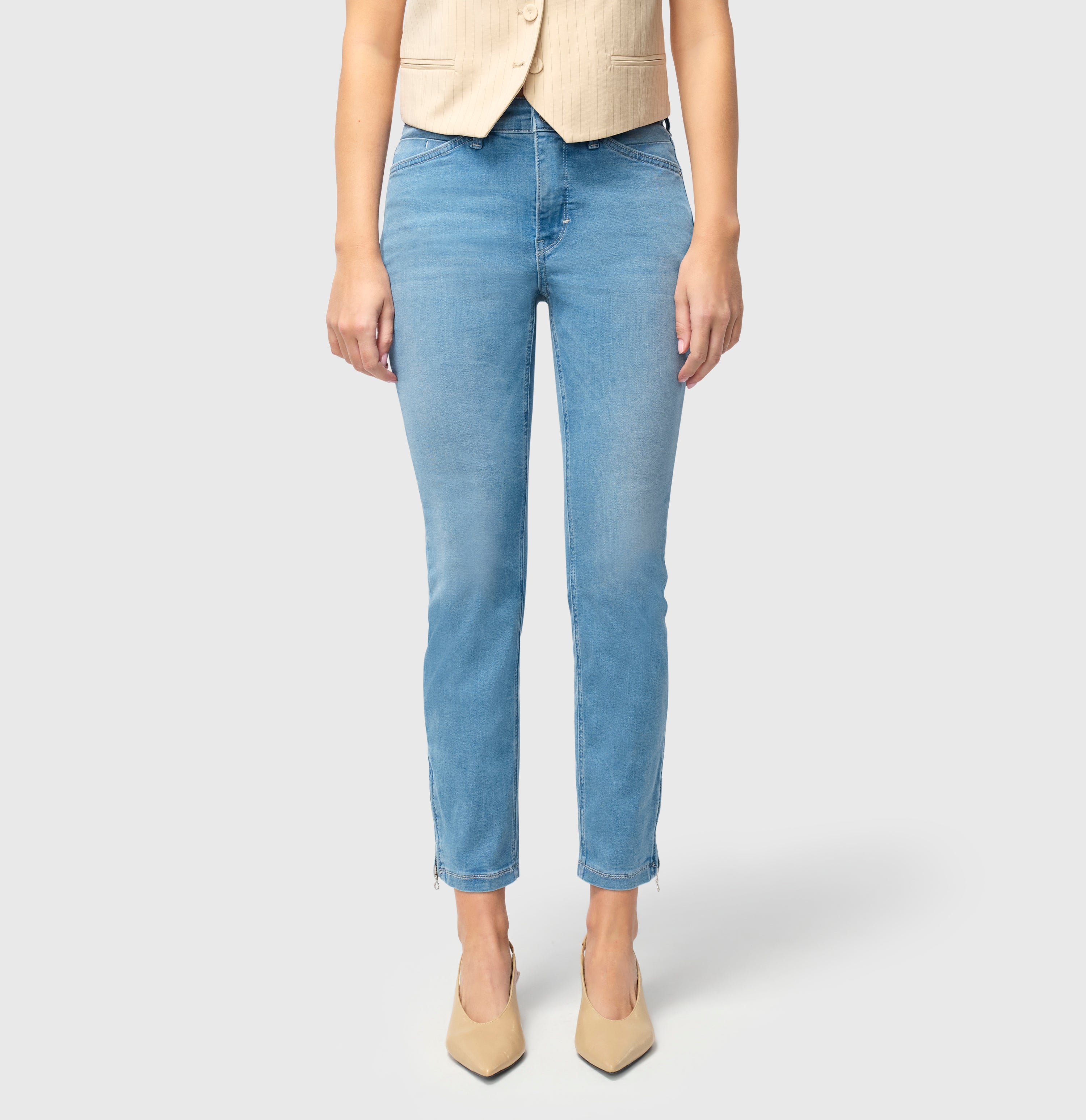 Cropped hyper stretch jeans with zip detail. | DREAM CHIC | classy grey blue wash | Side view of model