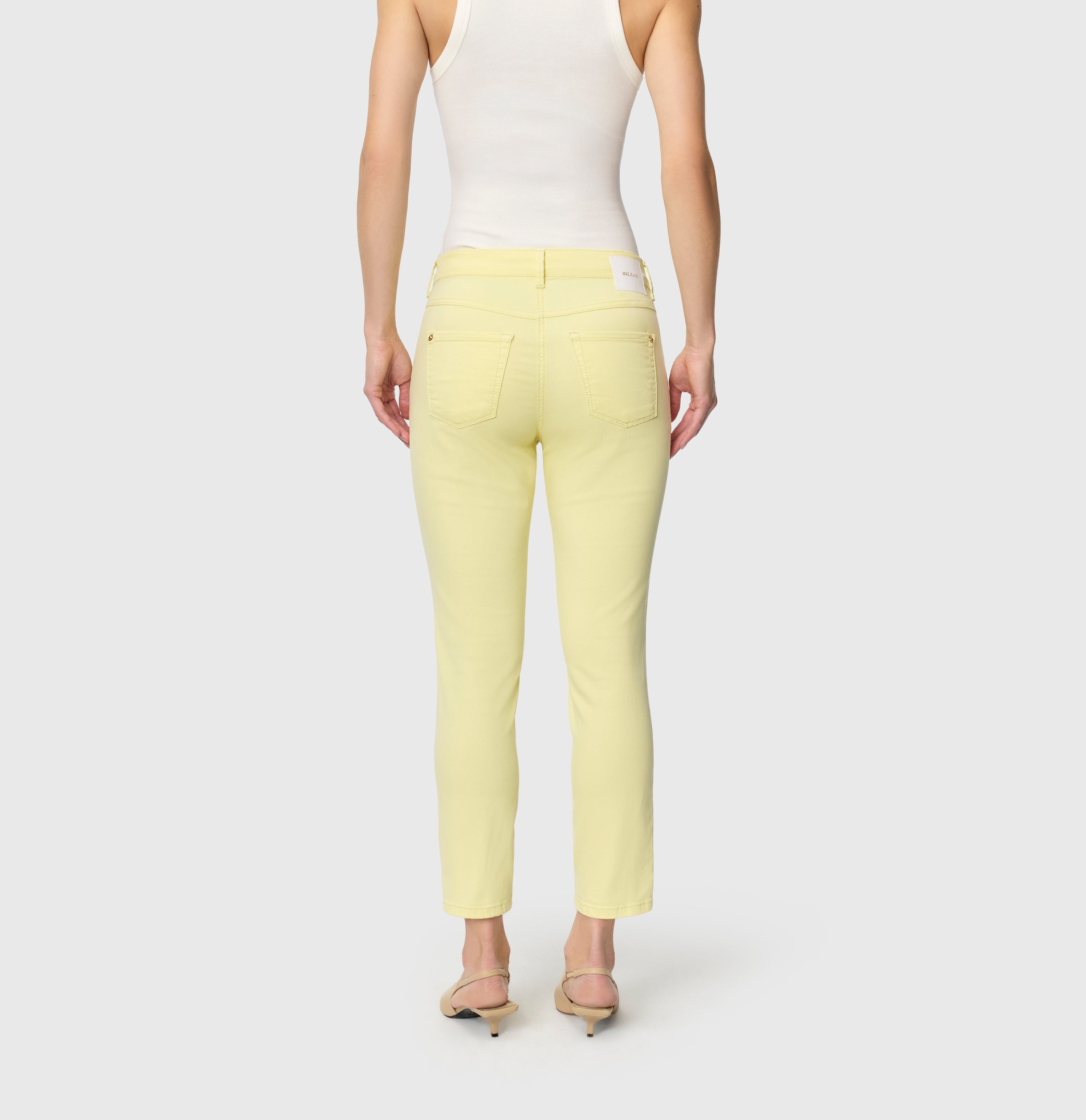 Slim jeans in a highly elastic material. | DREAM SUMMER | light sunny yellow PPT | Back view of model