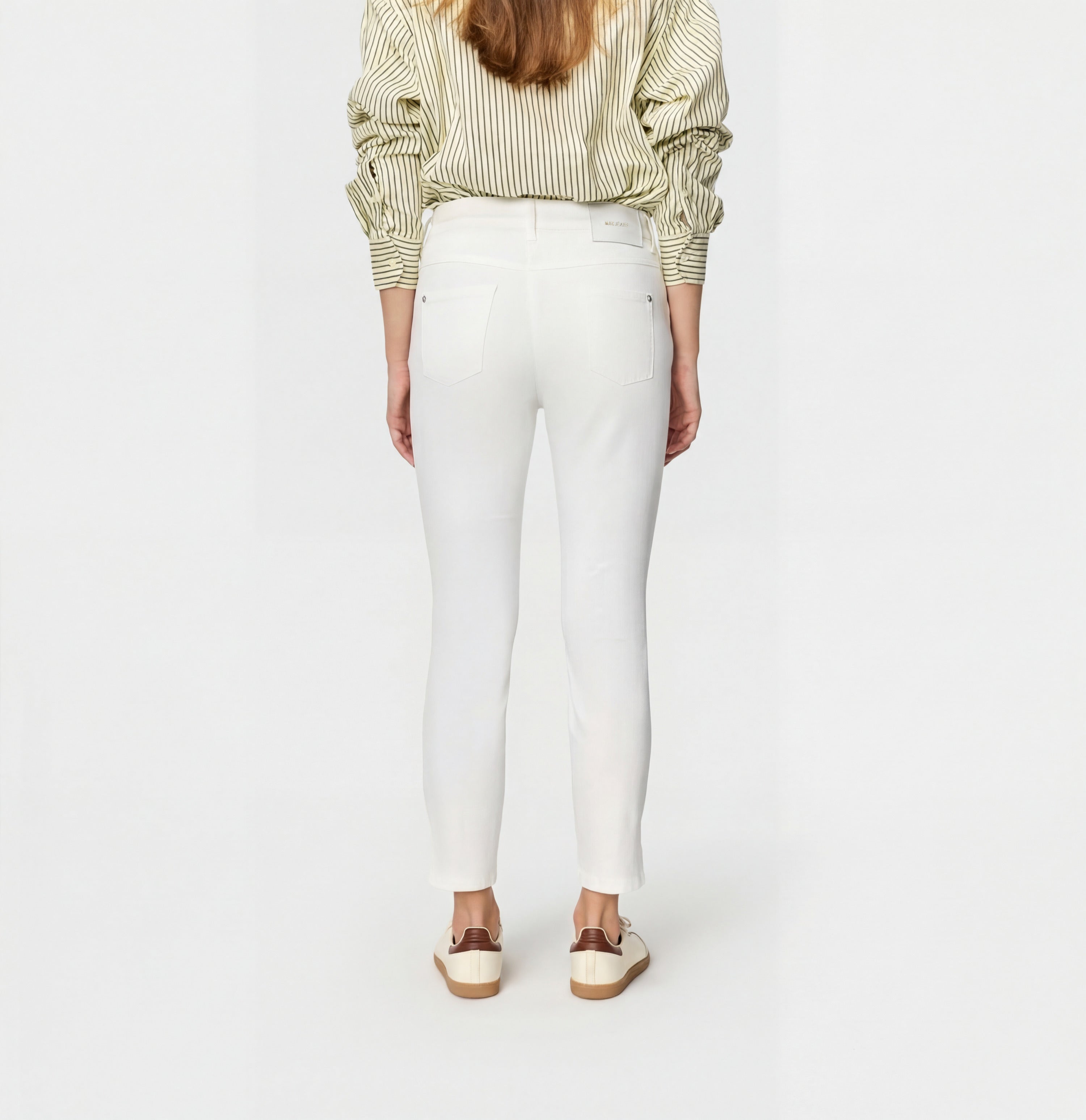 Slim shaping jeans in a modal blend. | DREAM SUMMER | white denim | Back view of model