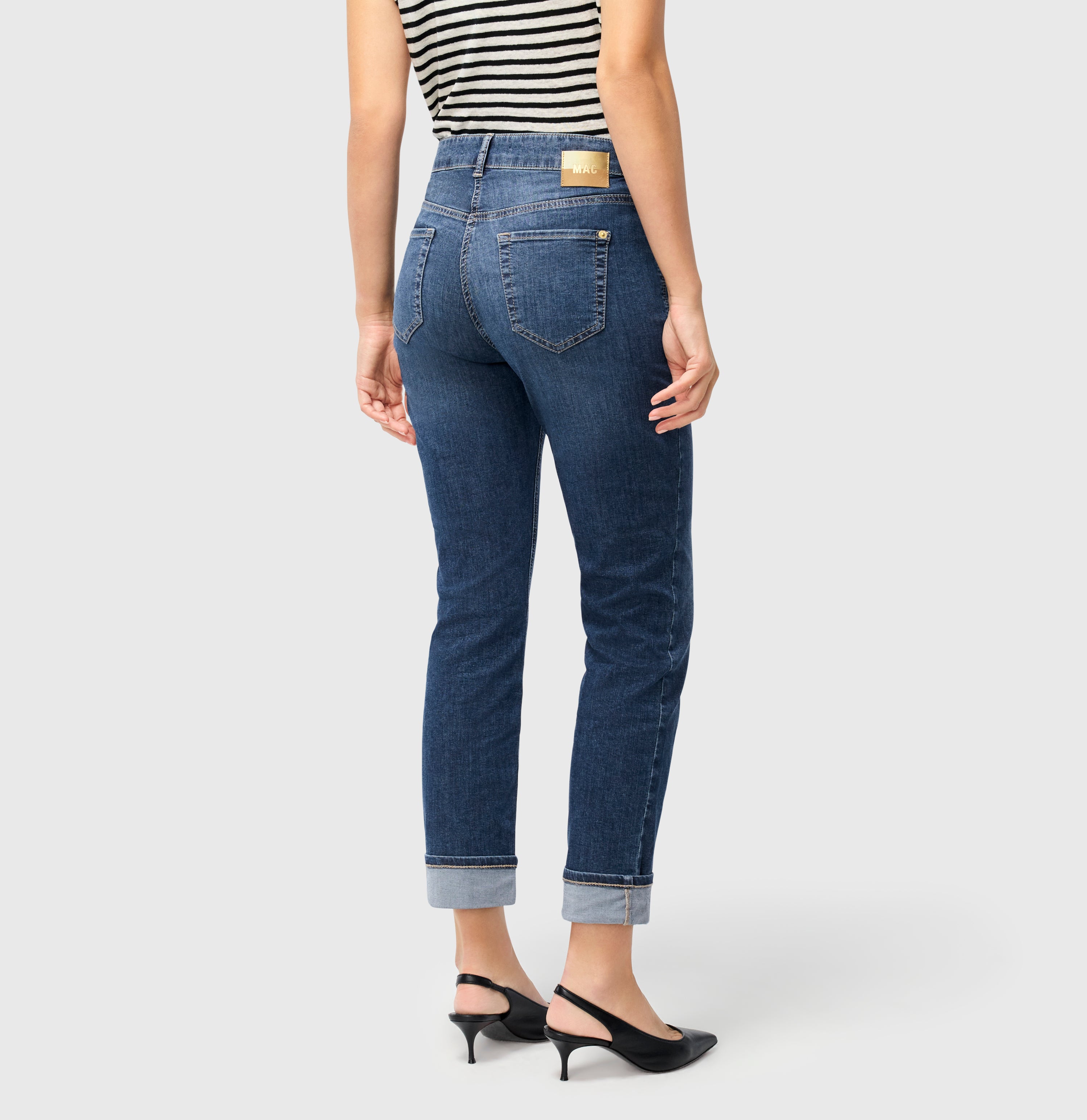 Straight fit made from light stretch denim. | SUE relax | mid blue commercial used | Back view of model