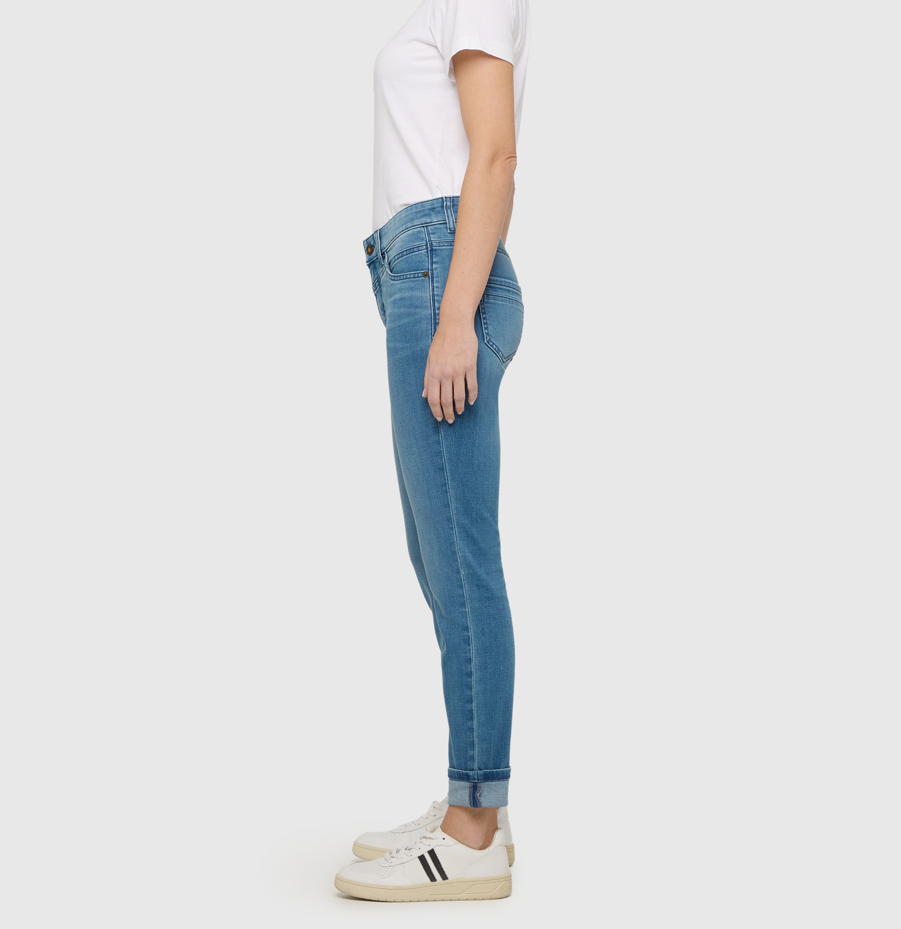 Slim jeans in a light cotton-modal blend. | RICH SLIM | authentic cobalt used | Side view of model
