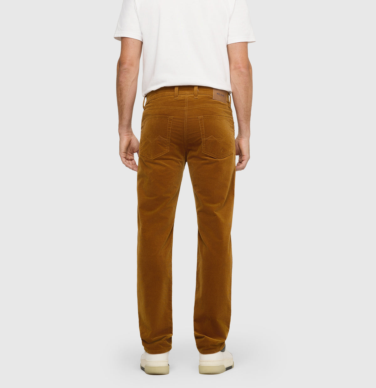 Modern fit made from soft, elastic fine corduroy. | Arne | cumin | Back view of model
