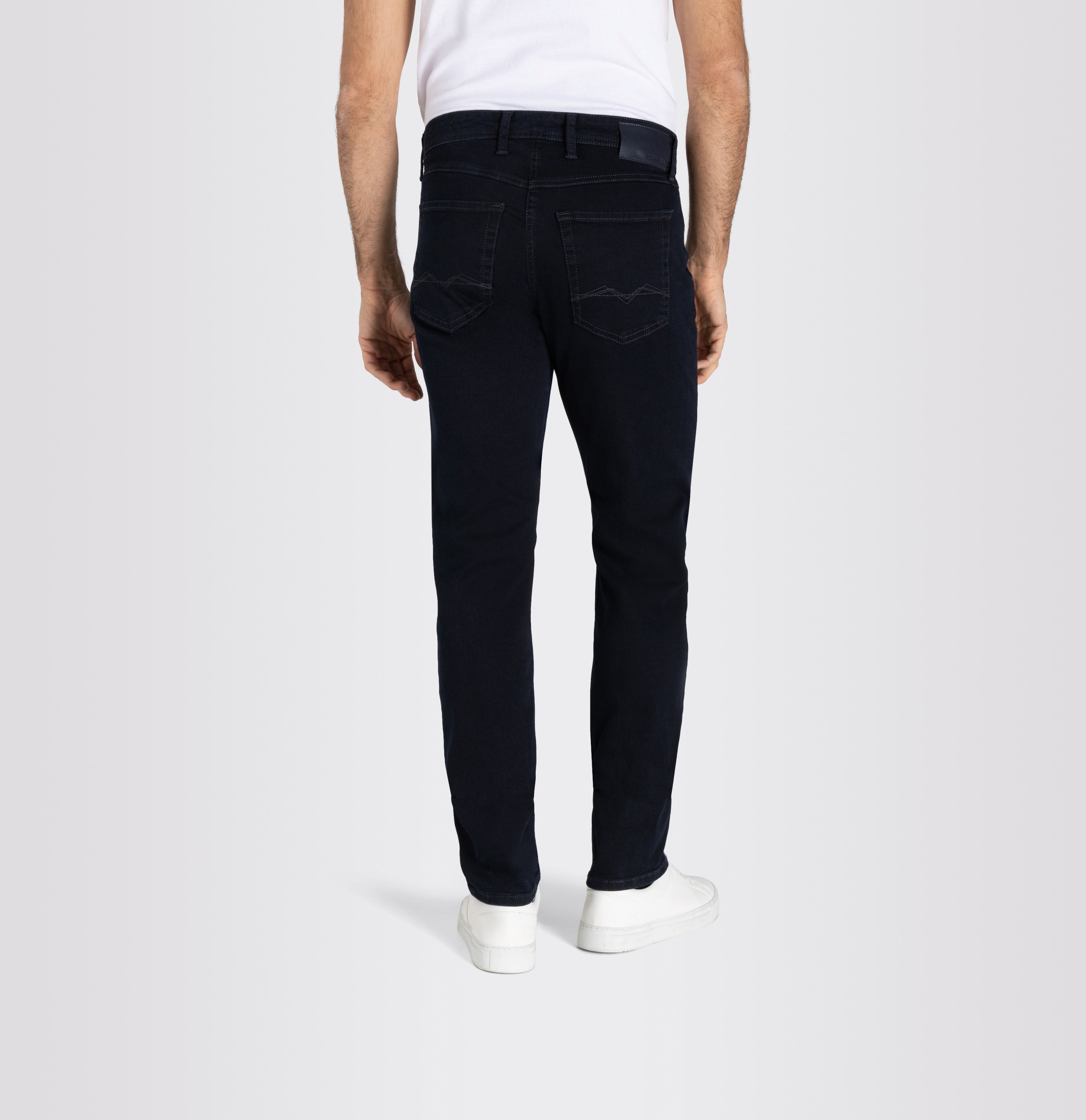 Driver jeans made of highly elastic denim. | Driver Jeans | blue black | Back view of model