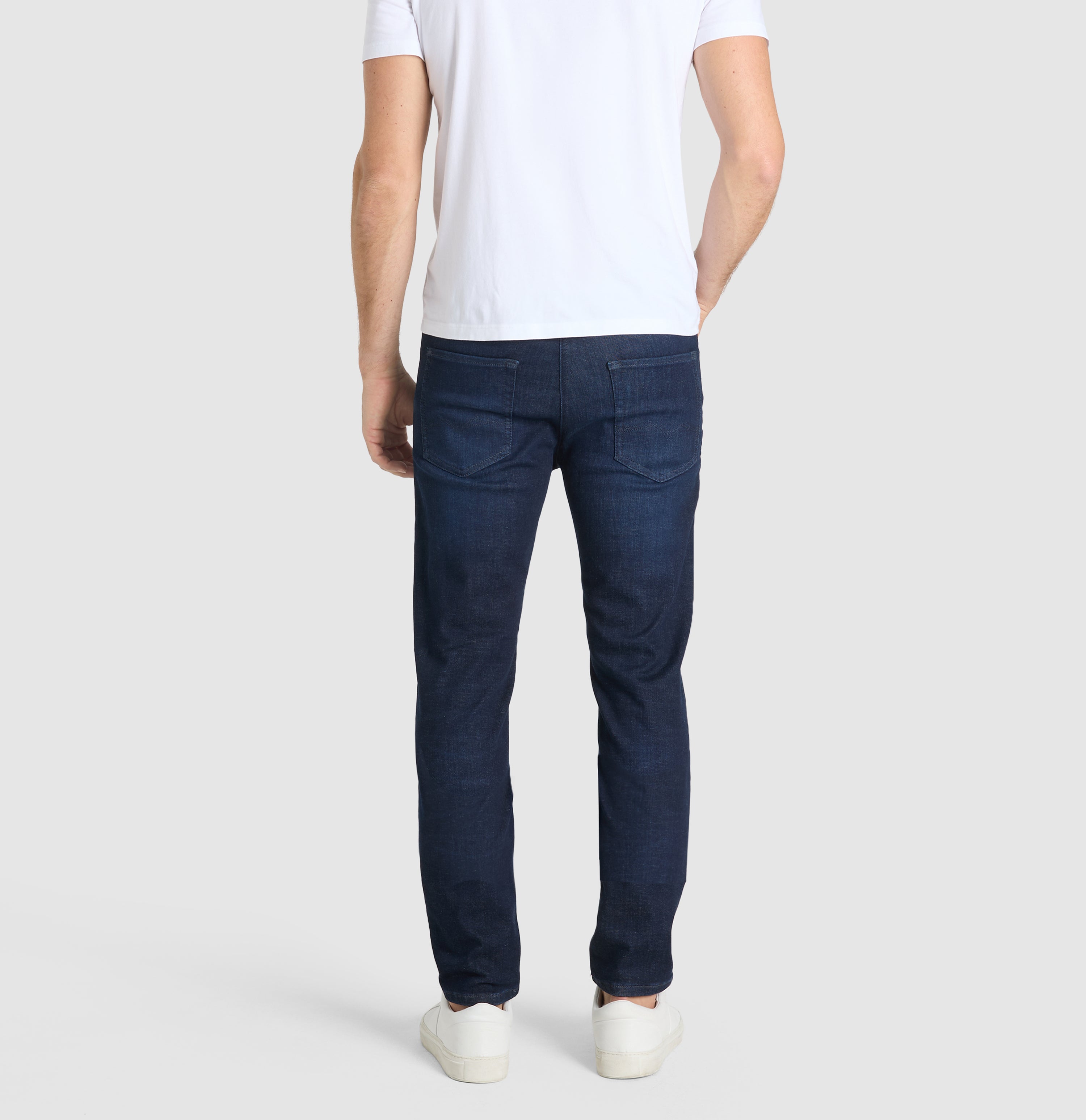 Ultimate driver jeans with a slim cut. | Driver Jeans | dark indigo used | Back view of model