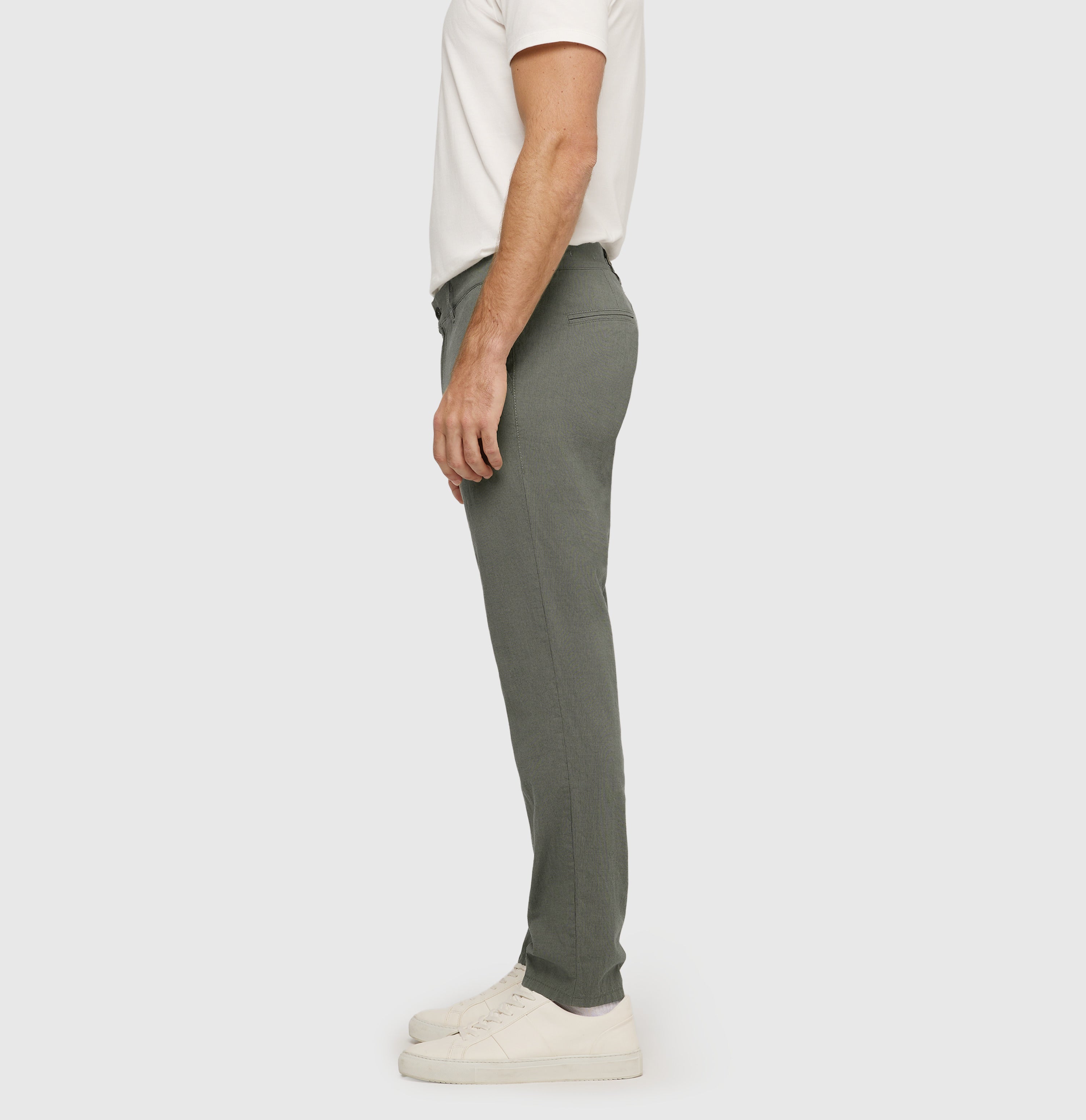 Summer trousers with micro texture. | Lennox | green tea | Side view of model