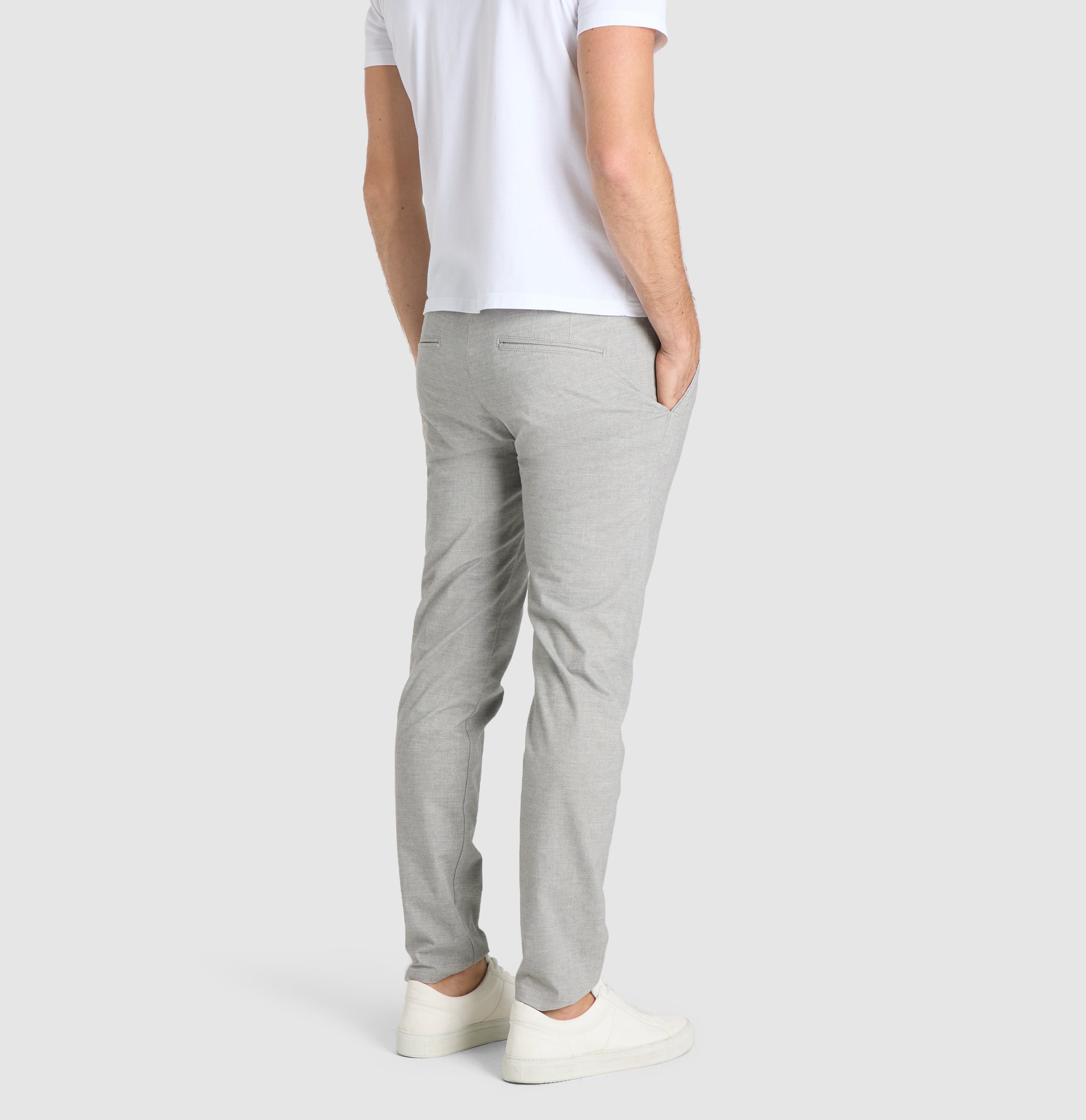 Chino in a finely patterned flannel material. | Lennox | tin printed | Back view of model