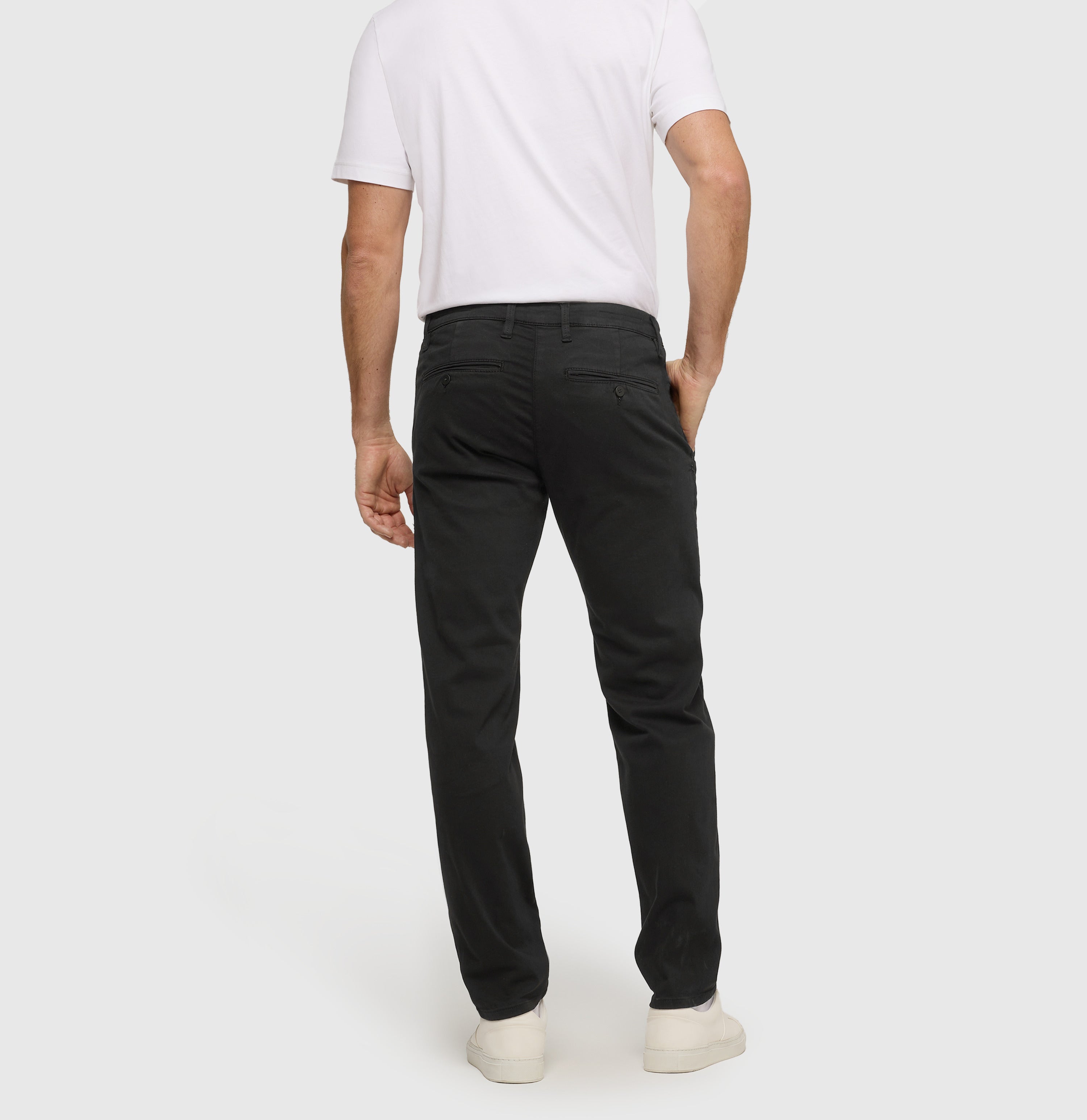 Ultimate driver pants in a chino design. | Driver Pants | black | Back view of model