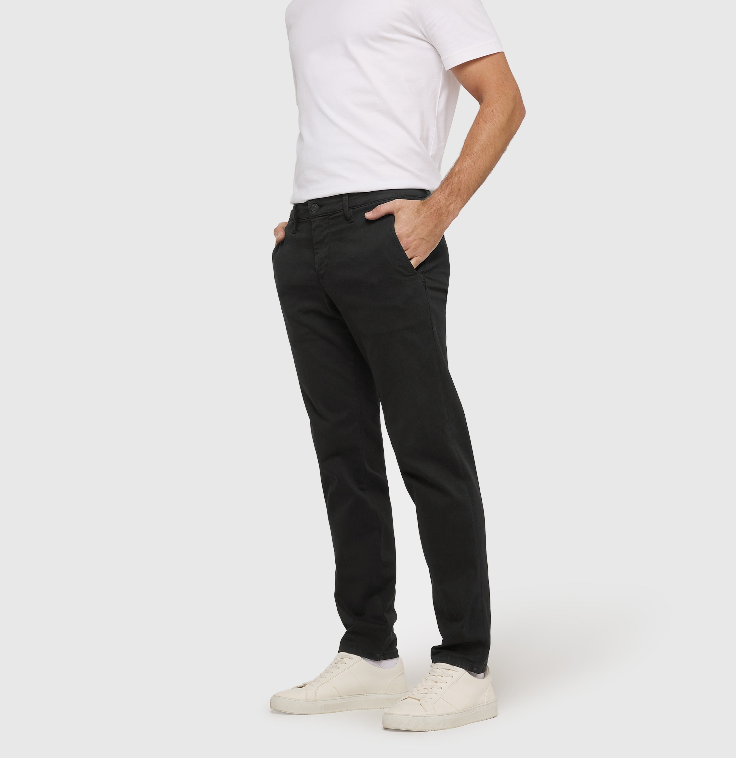 Ultimate driver pants in a chino design. | Driver Pants | black | Side view of model