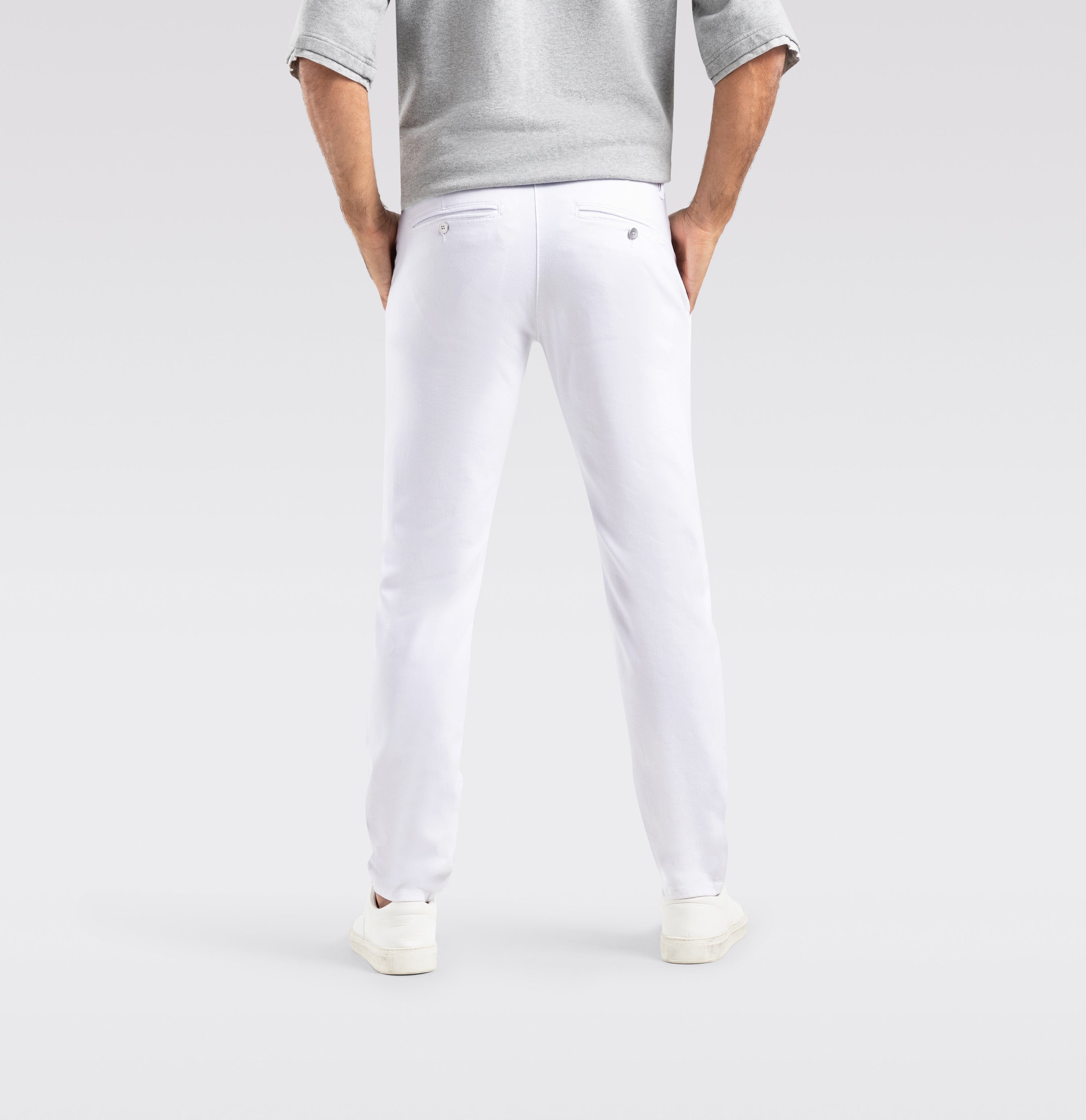 Ultimate driver pants with a chino look. | Driver Pants | white denim | Back view of model
