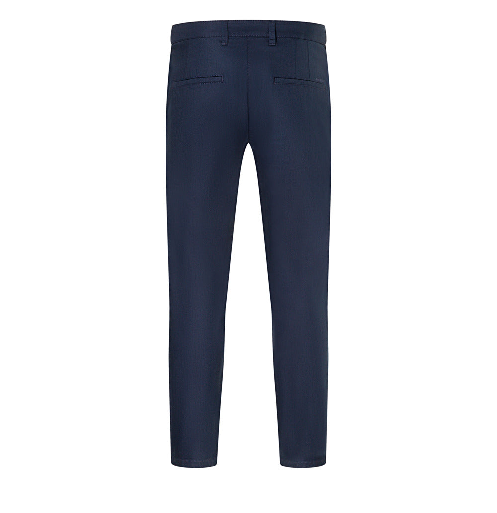 Tapered chino in a techno twill material. | Griffin | nautic blue | Back view of bust