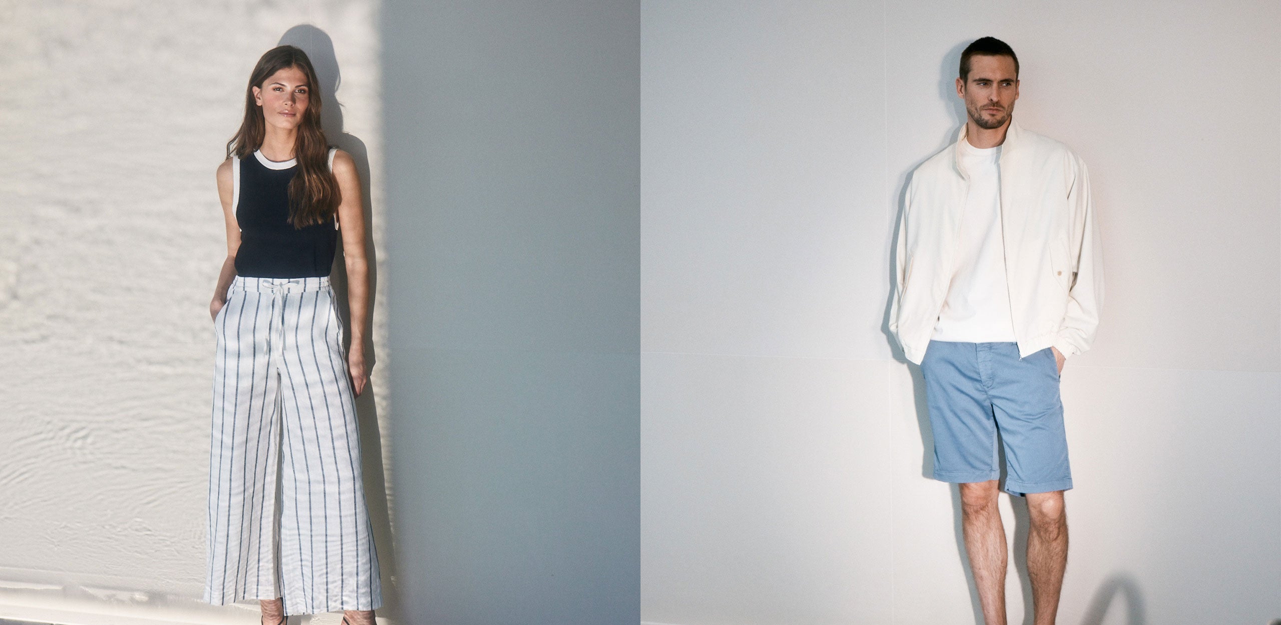 Split campaign image featuring a woman in a black sleeveless top and white striped wide-leg trousers, alongside a man in a white jacket, white T-shirt and light blue shorts, standing against a minimalist wall in soft natural light.