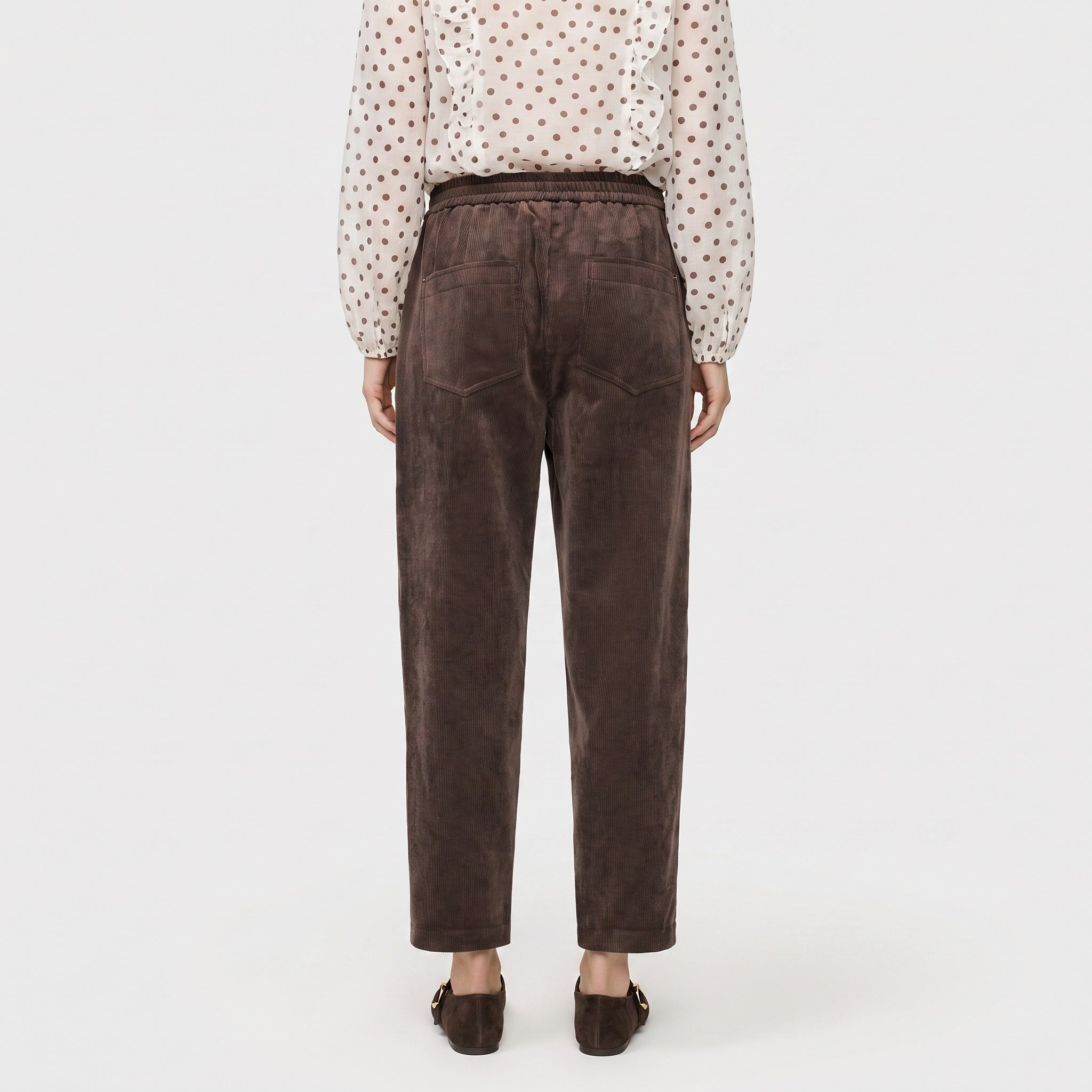 Corduroy trousers with cuff. | EVA 2.3 | truffle brown | Back view of model