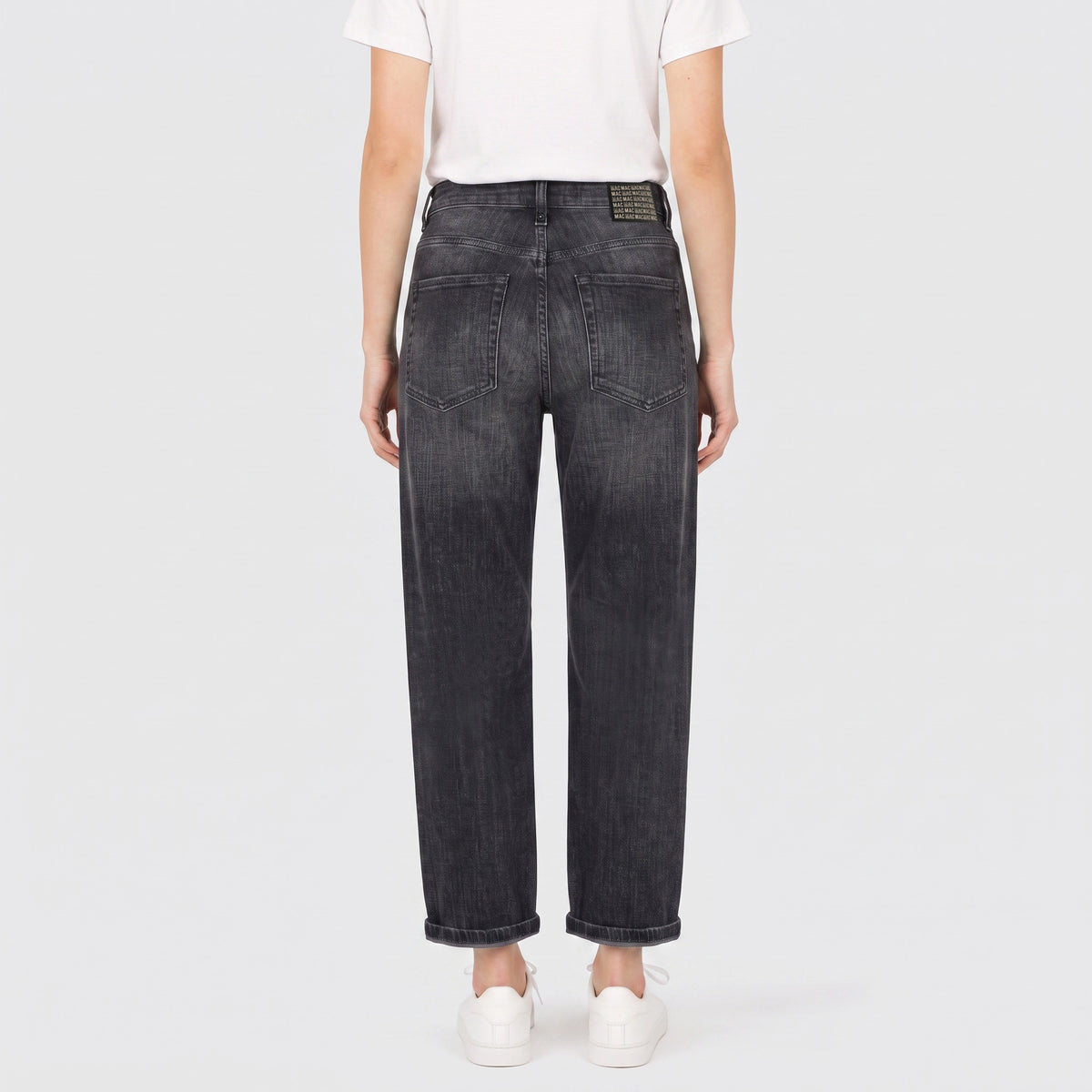 Boyfriend jeans with turn-up. | BOYFRIEND | dark grey used wash | Back view of model