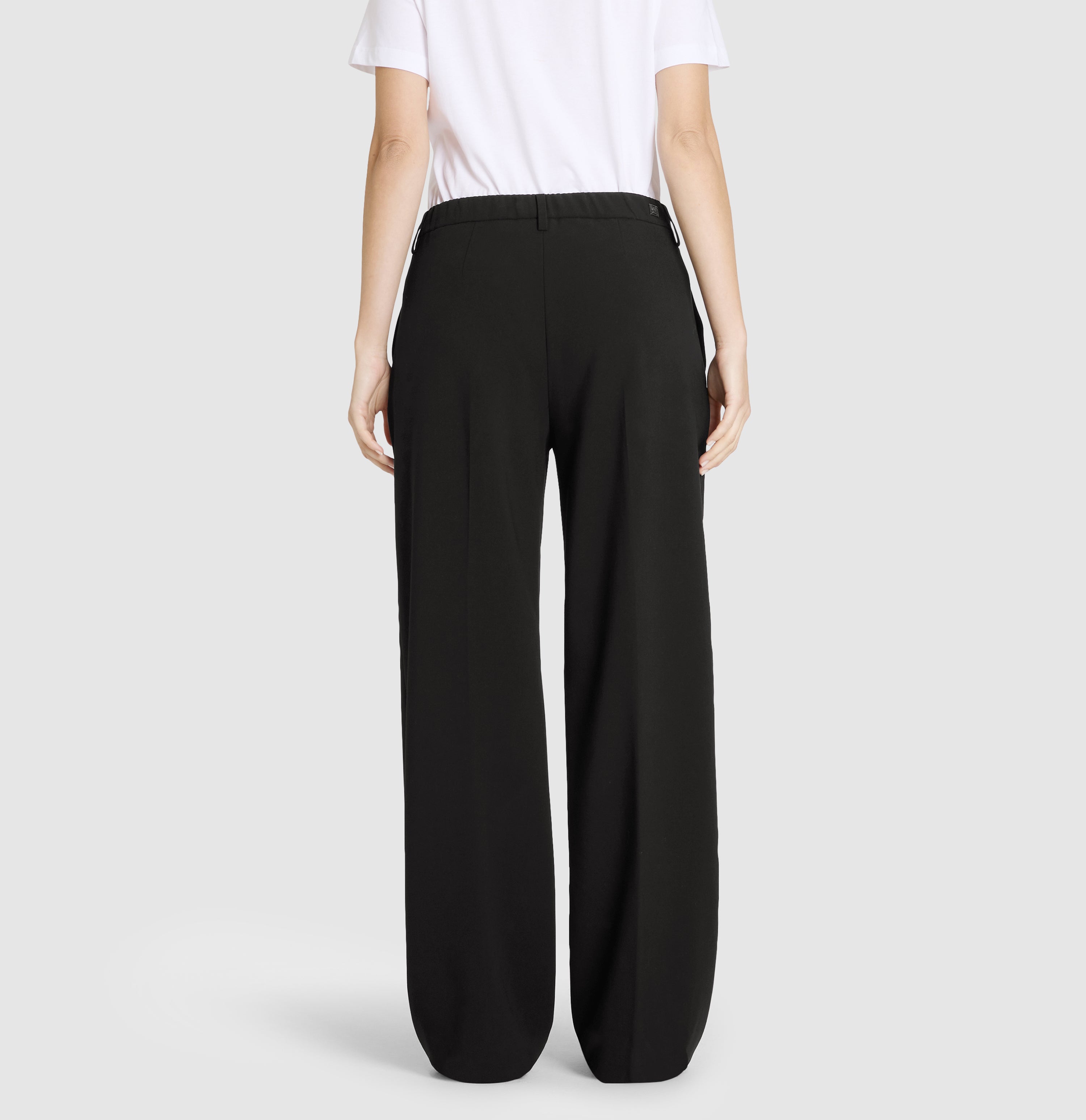 Wide fit made from easy care bi-stretch. | S-NAME | S-FBBZ | Back view of model