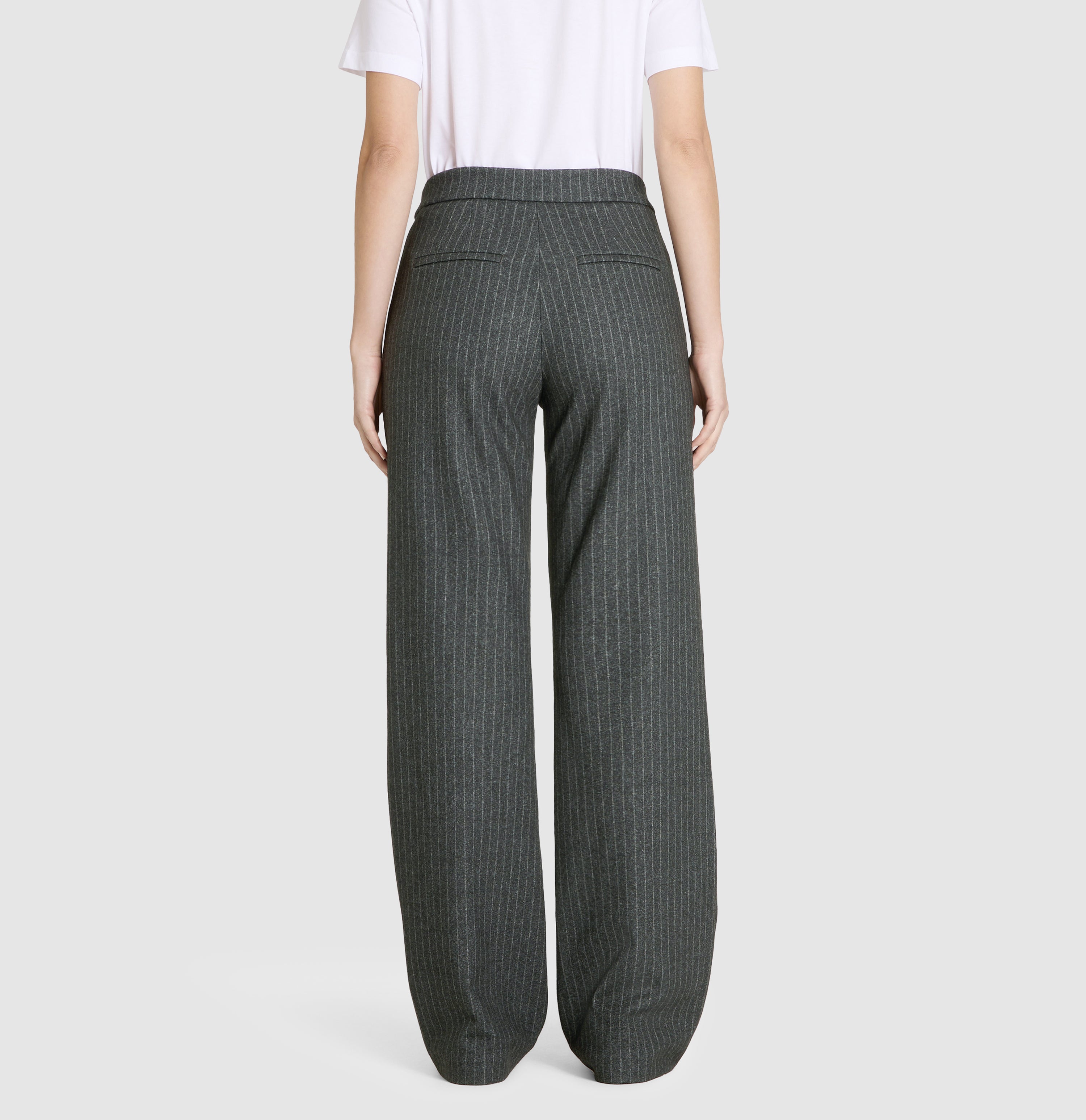 Wide jump-in trousers made of premium jersey. | CHIARA SMART | dark shadow stripes | Back view of model