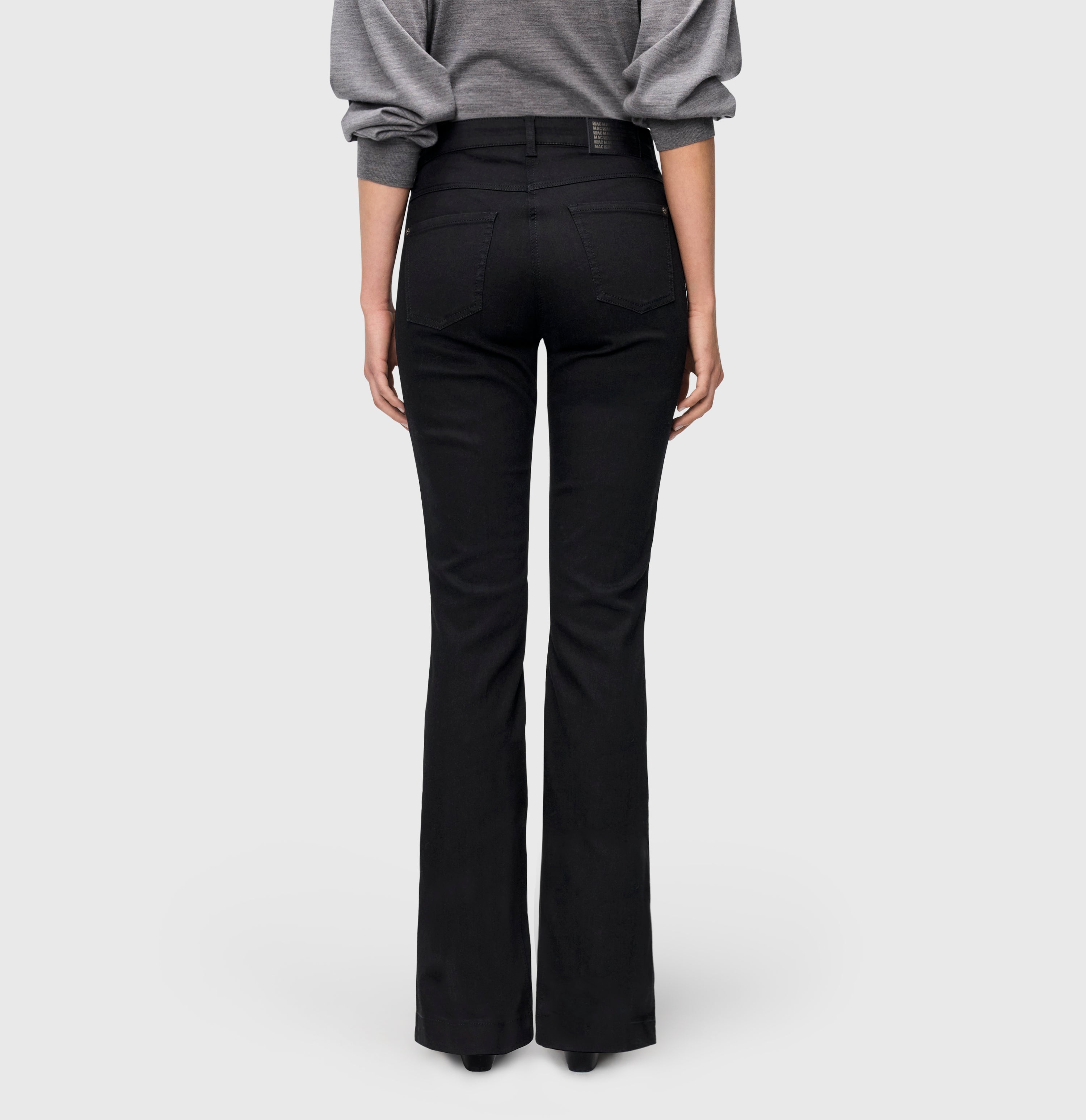 Figure-shaping boot cut jeans with an authentic look. | S-NAME | S-FBBZ | Back view of model