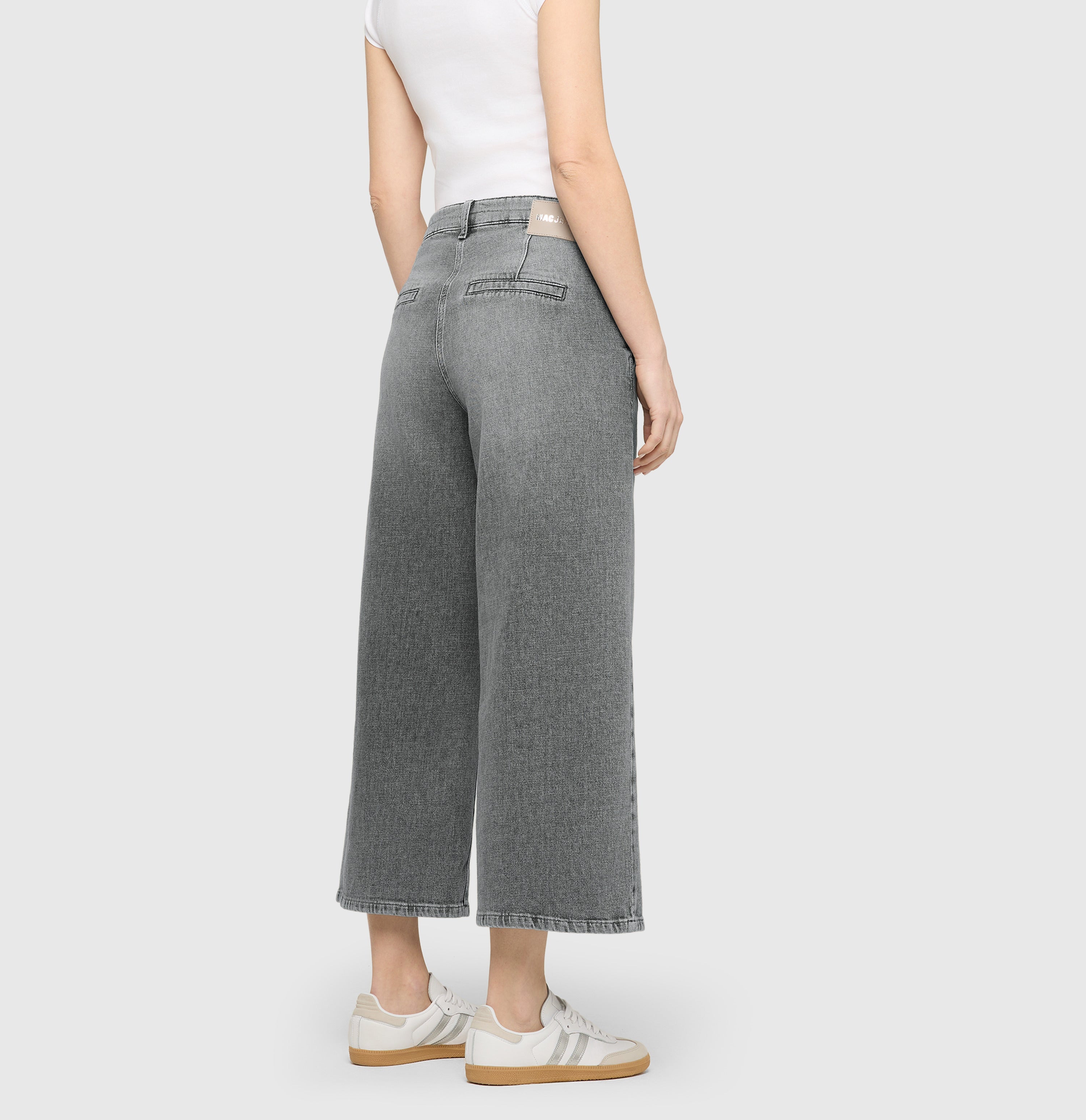 Denim culotte with sporty seam details. | JUNA | ash grey used wash | Back view of model