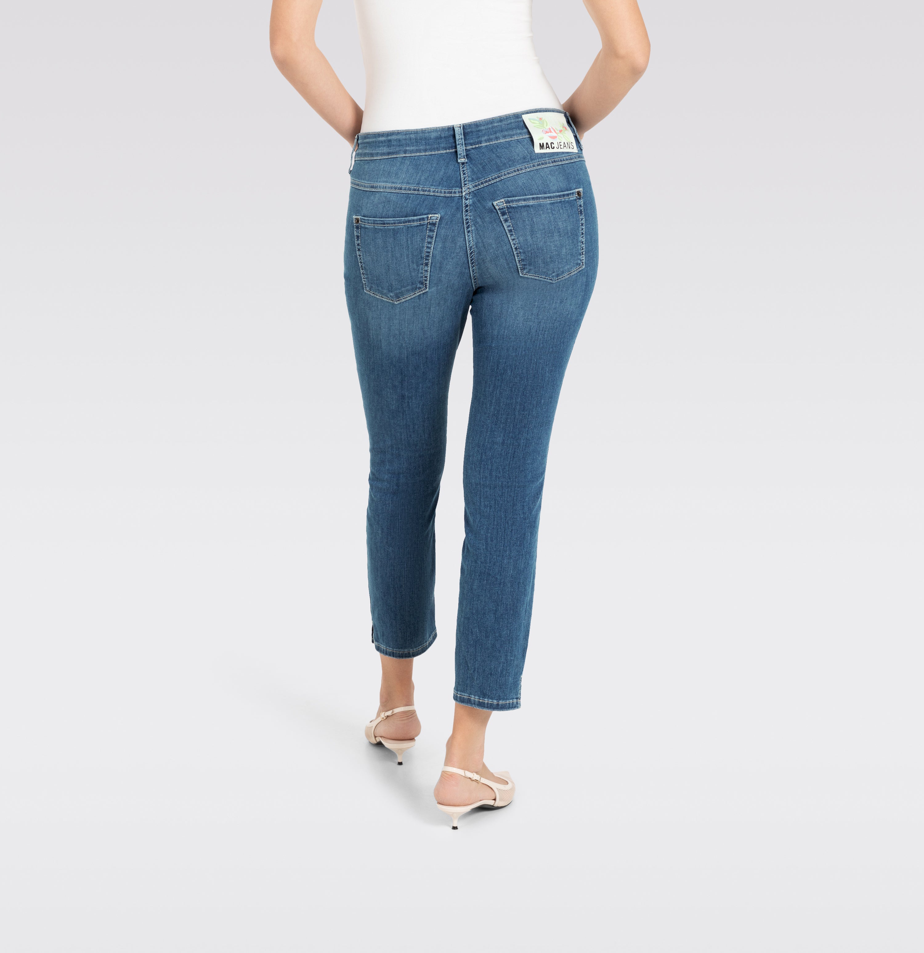 Figure-shaping slim jeans in a light modal blend. | DREAM SUMMER | authentic used blue | Back view of model