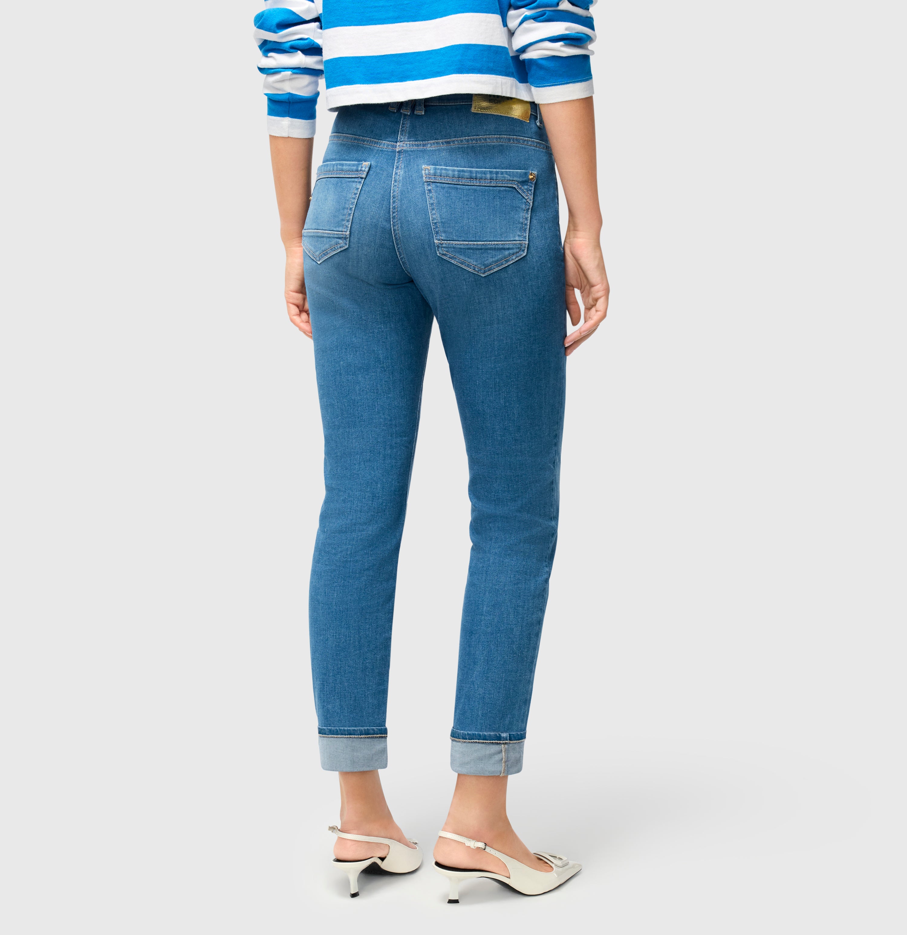 Slim jeans in a light lyocell blend. | RICH SLIM | chic cobalt used | Back view of model