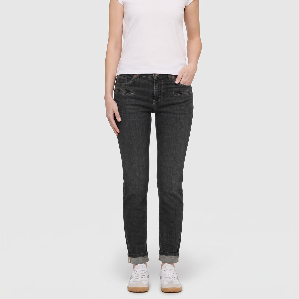 Slim jeans with pocket detail. | SLIM | brown tinted black wash | Front view of model