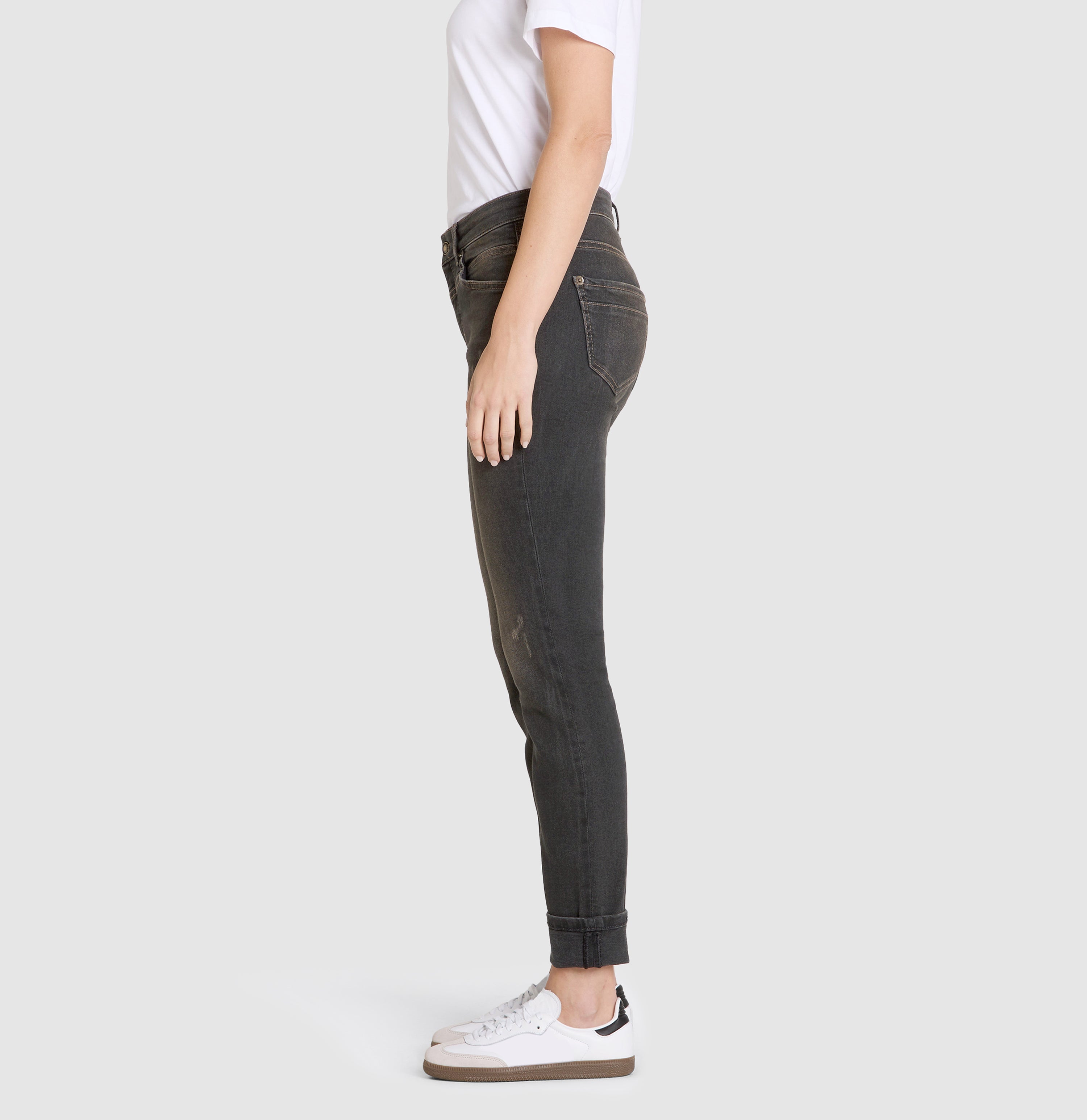 Slim jeans in a light material blend. | RICH SLIM | fancy brown black | Side view of model