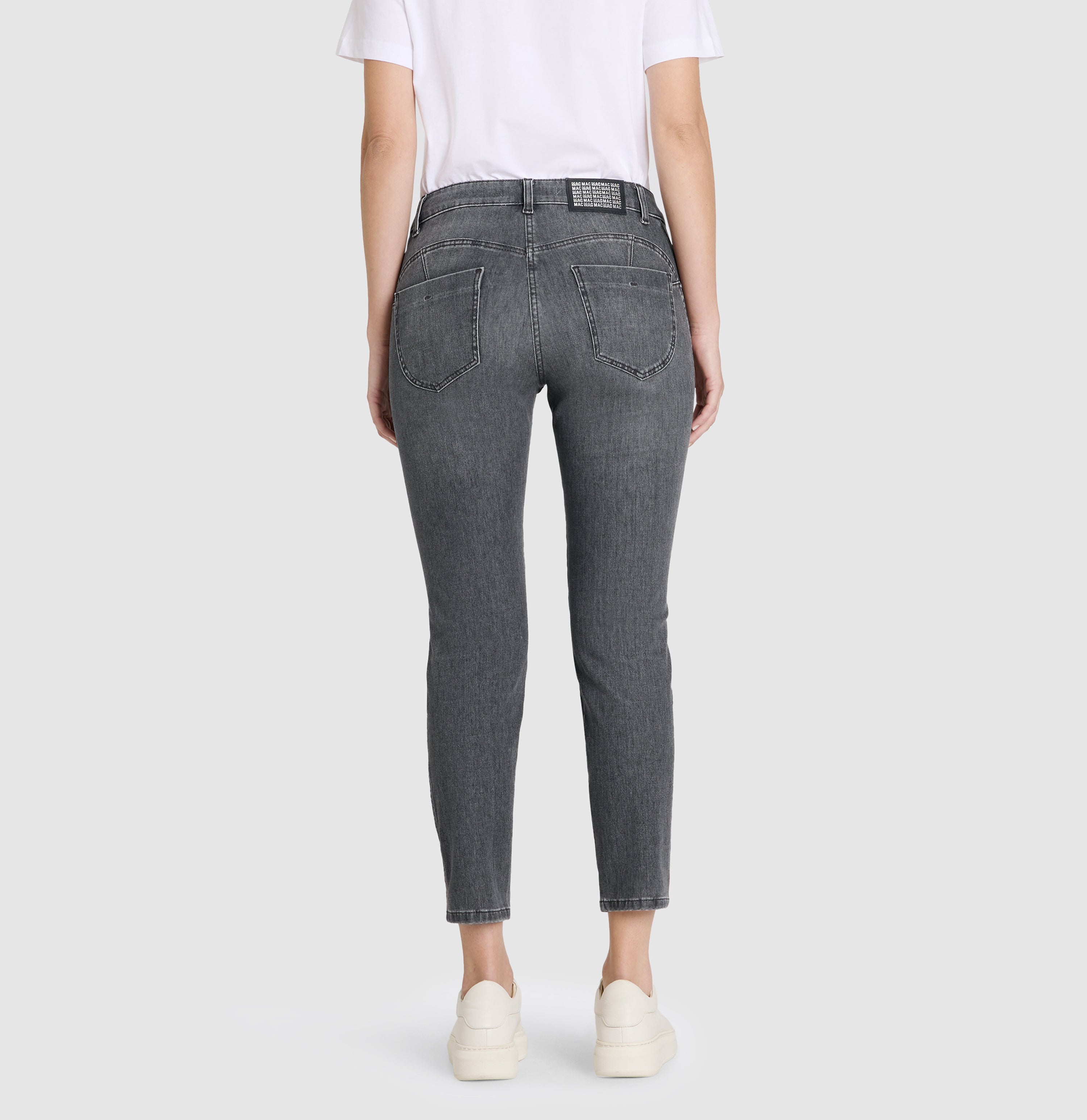 Skinny jeans with details at the leg hem. | S-NAME | S-FBBZ | Back view of model