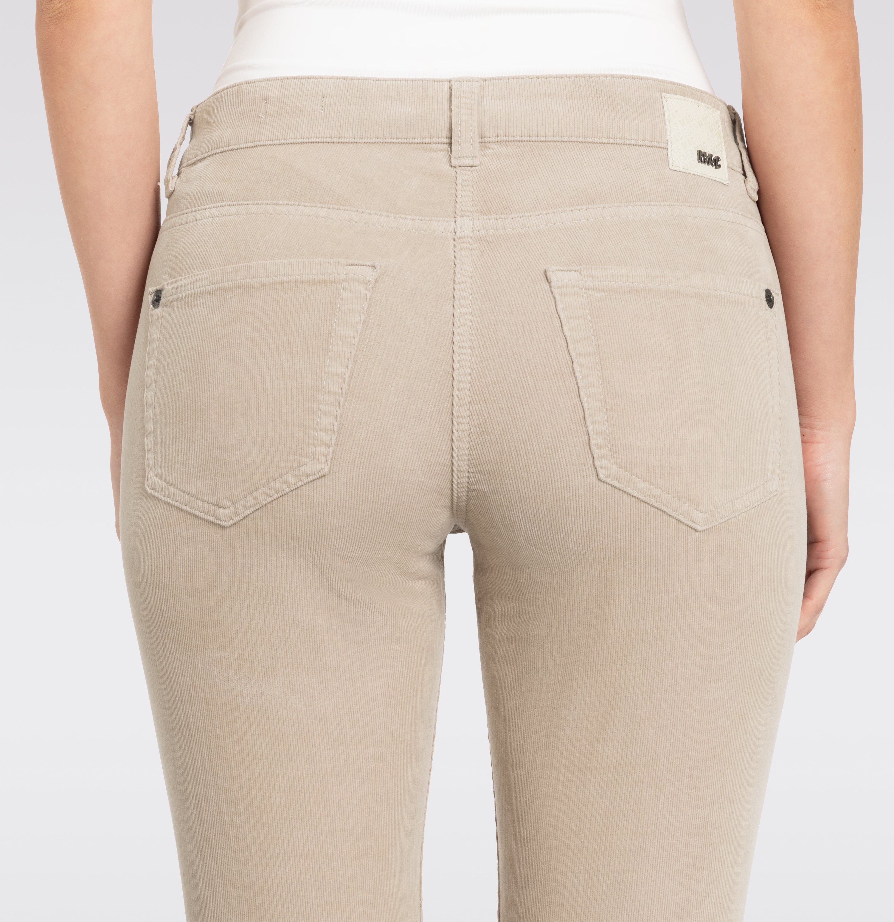 Slim cut trousers made of brilliantly coloured baby corduroy. | SLIM | sand beige PPT | Detailed view 3 of model
