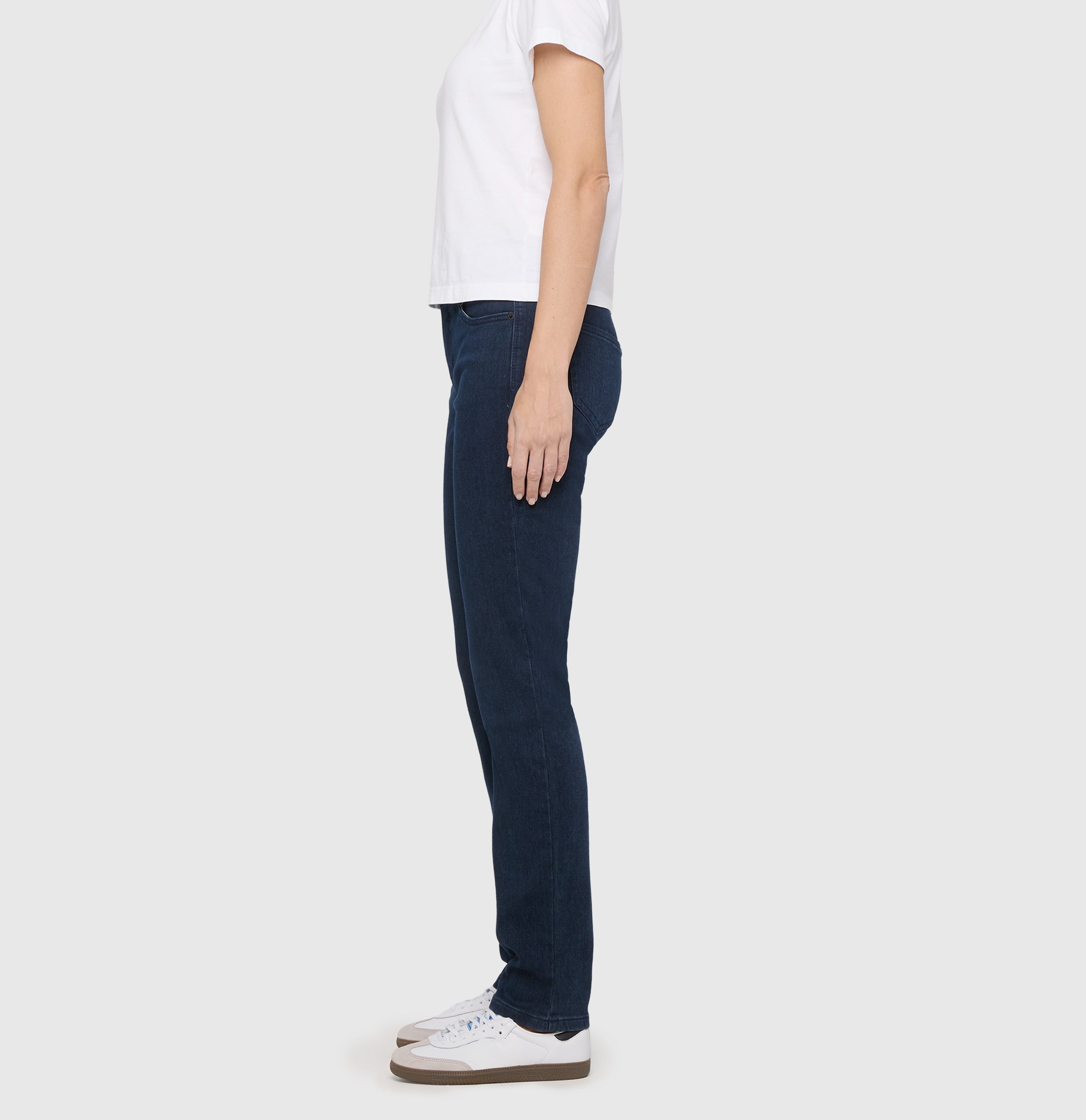 Slim thermal jeans jeans with zip detail. | SLIM | dark blue commercial wash | Side view of model