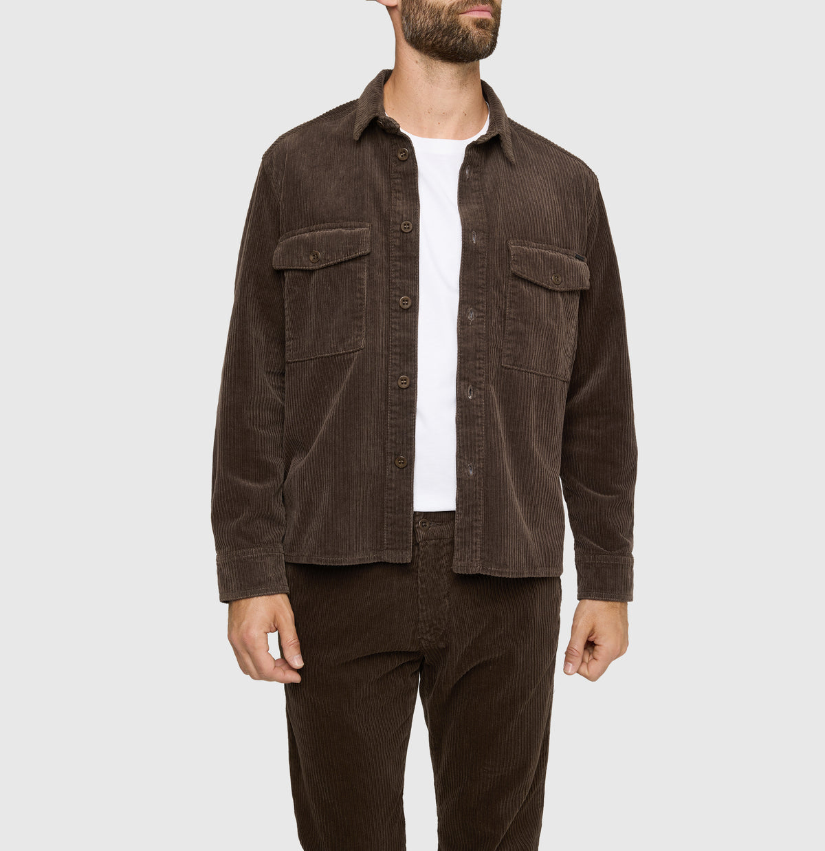 Overjacket in a modern corduroy material. | Overjacket | hot fudge | Side view of model