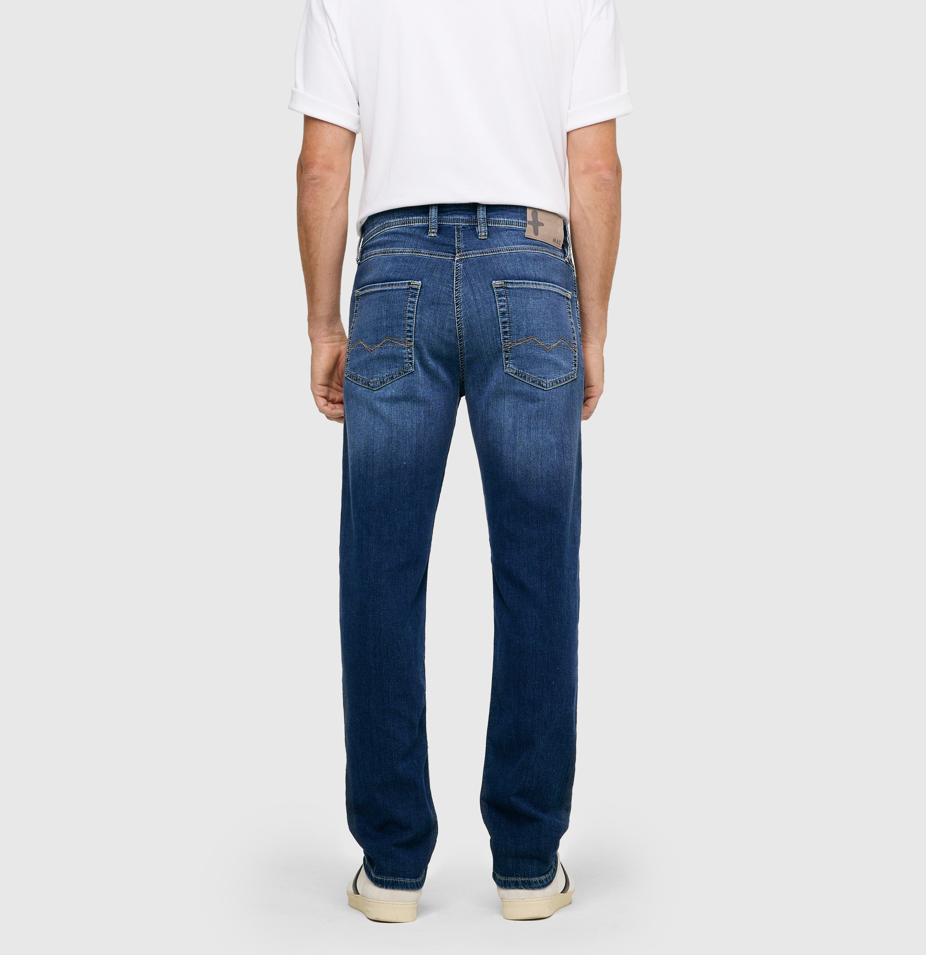 Modern fit made from soft sweat denim. | Jog´n Jeans by MAC | light authentic used | Back view of model