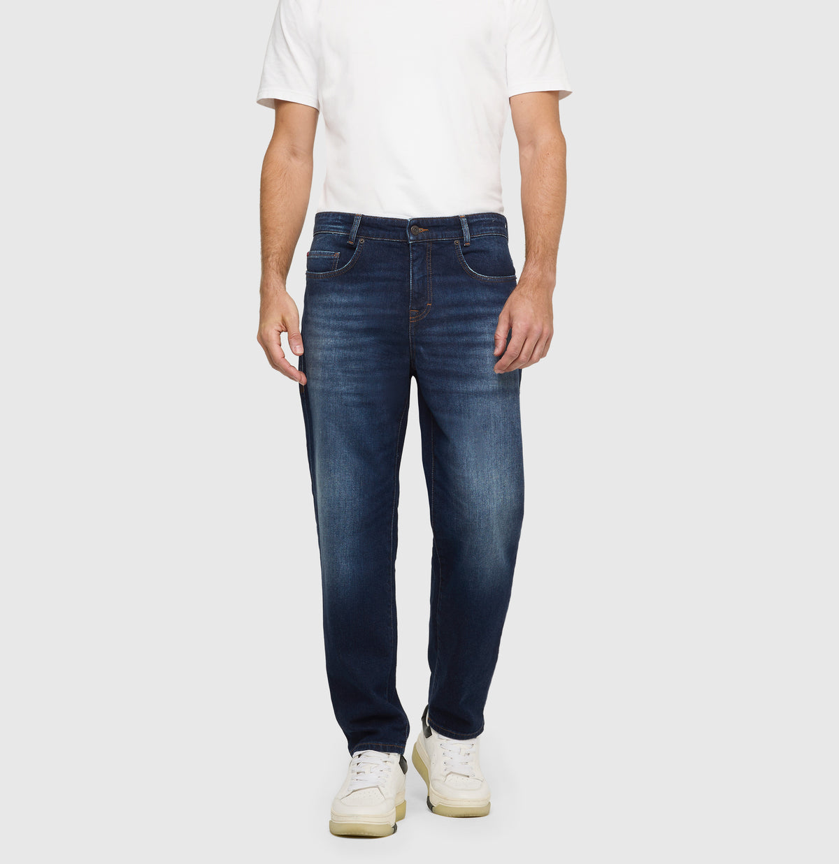 Tapered fit made from New Vintage Denim. | Dan | dark blue 3D wash | Front view of model