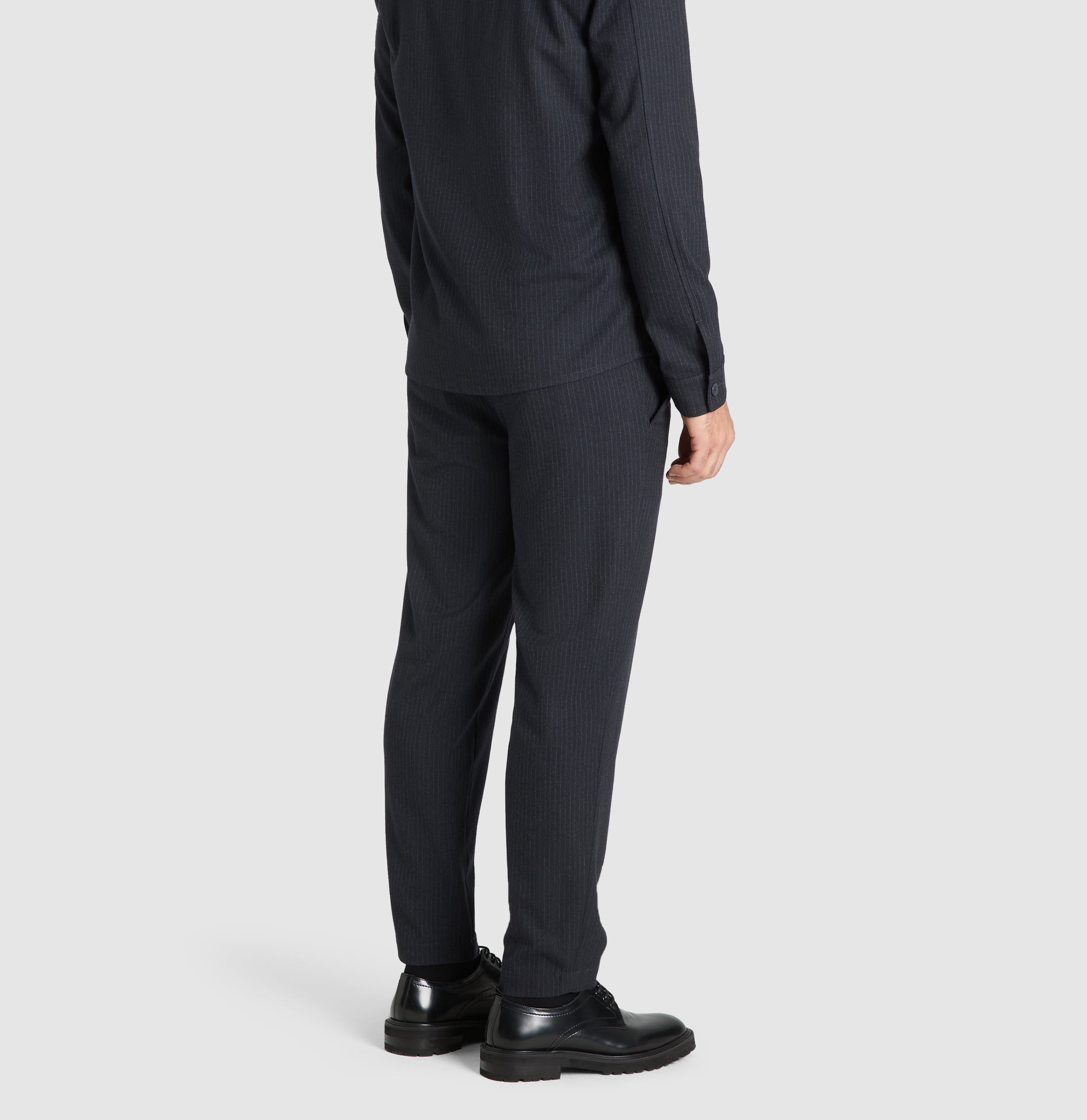 Flannel chino with fine pinstripes. | Dean | midnight blue stripes | Campaign image