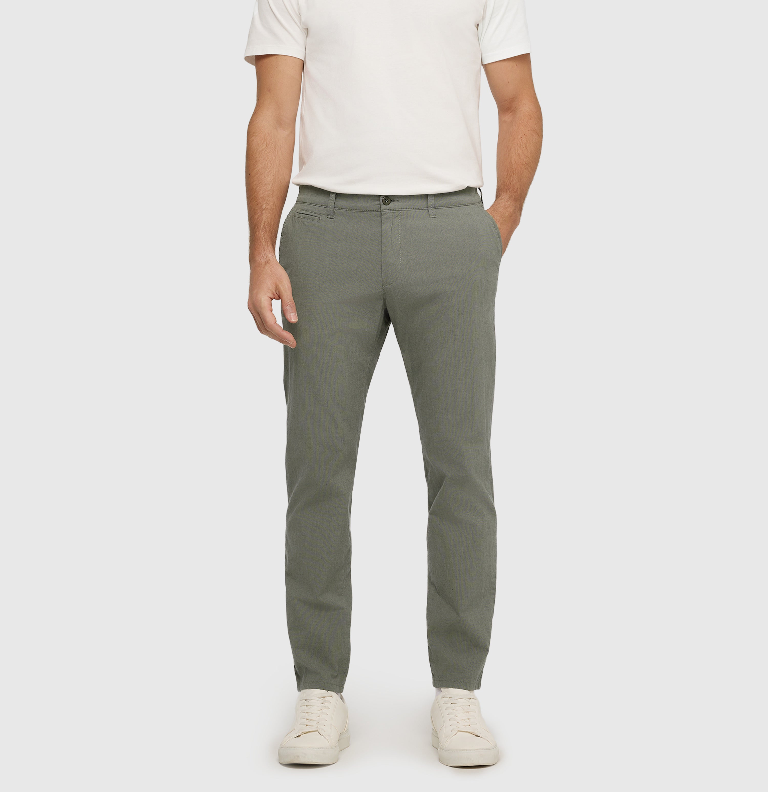 Summer trousers with micro texture. | Lennox | green tea | Front view of model