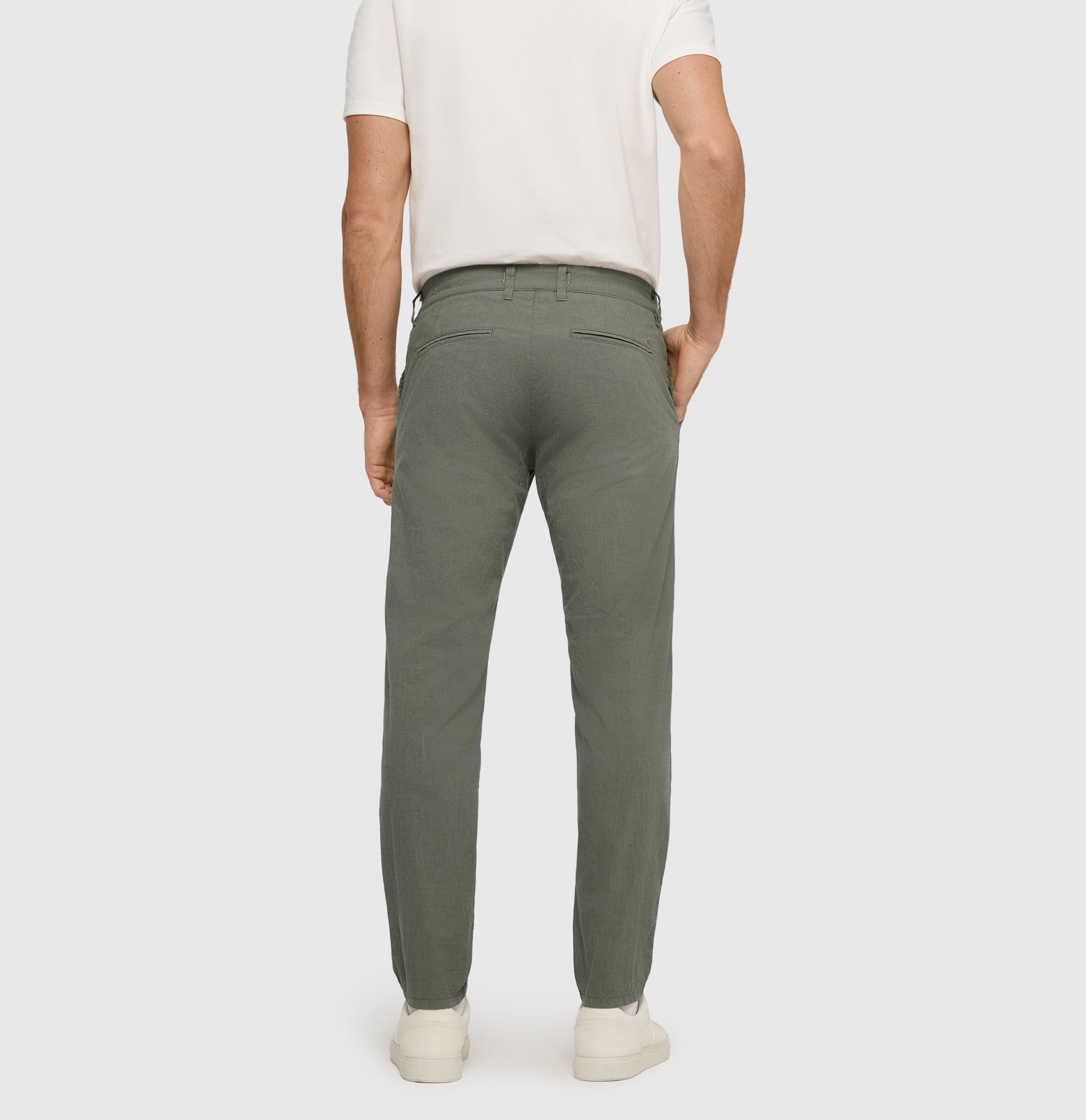 Summer trousers with micro texture. | Lennox | green tea | Back view of model