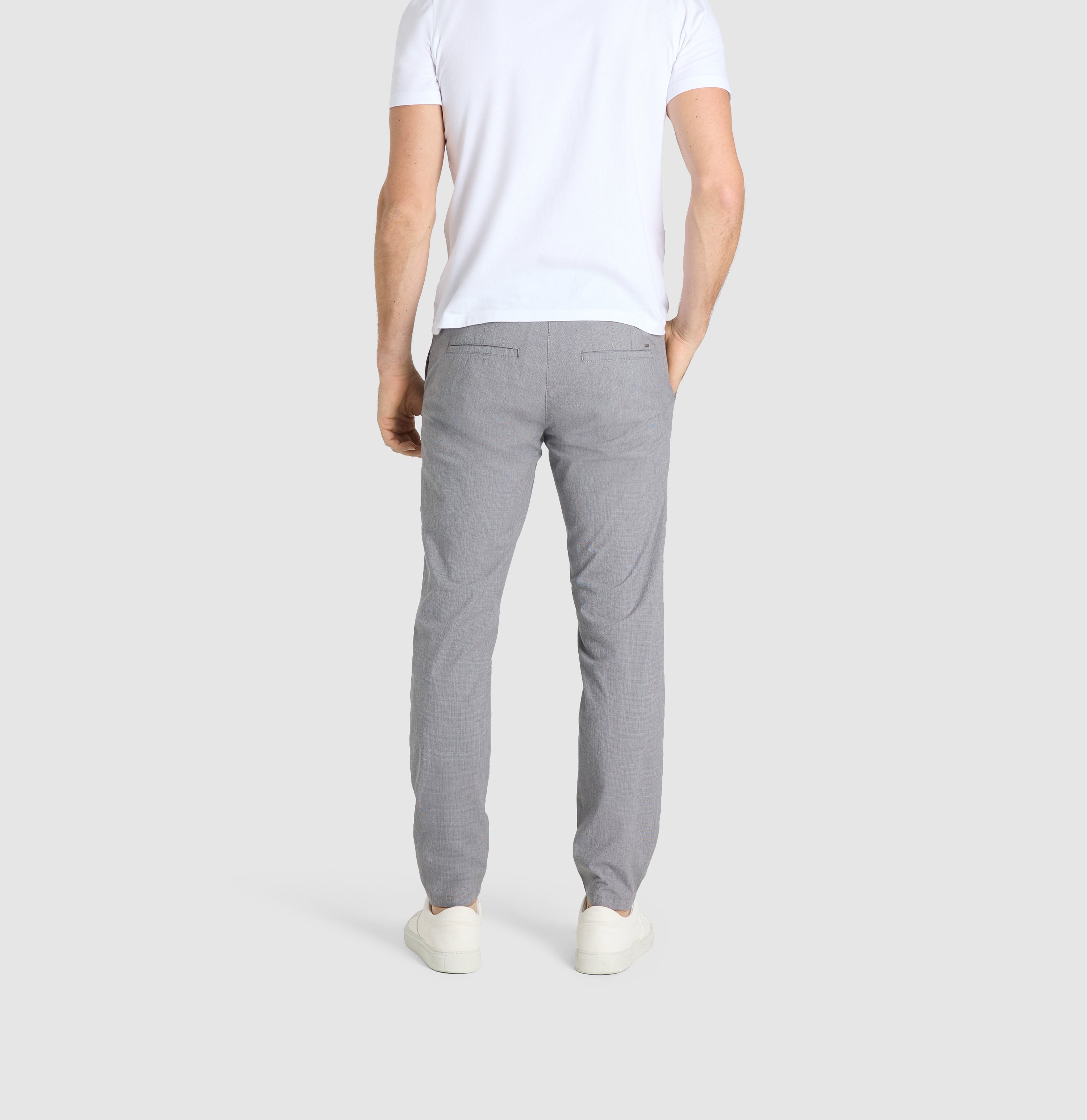 Tapered chino with organic cotton. | Griffin | silver | Back view of model